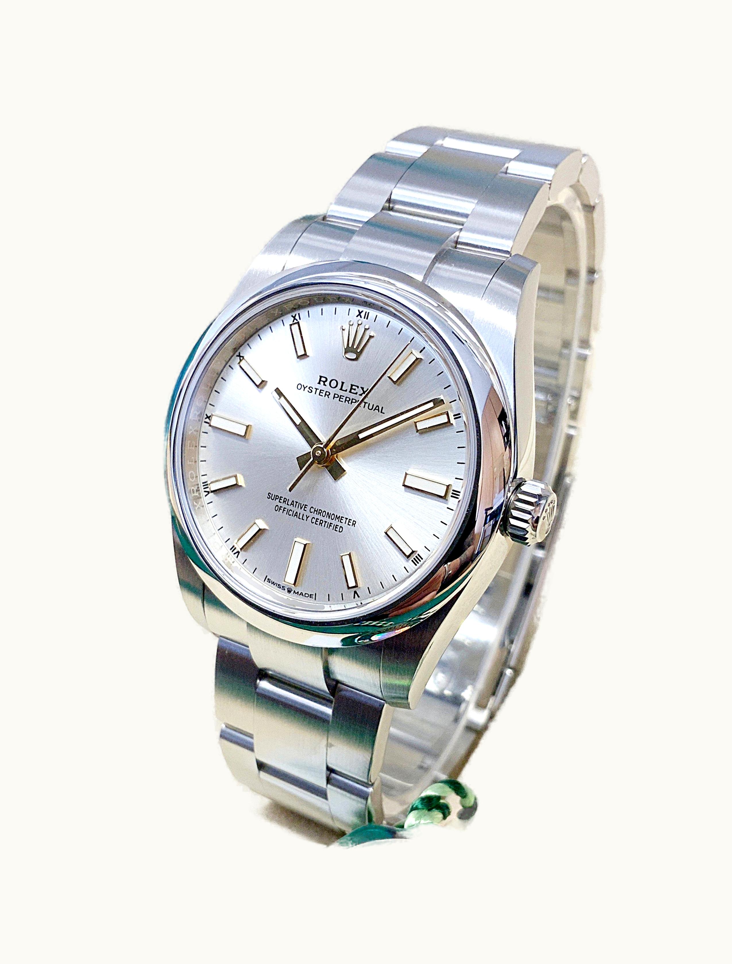 Rolex Oyster Perpetual Date 34 Stainless Steel Fluted / Oyster / Pink