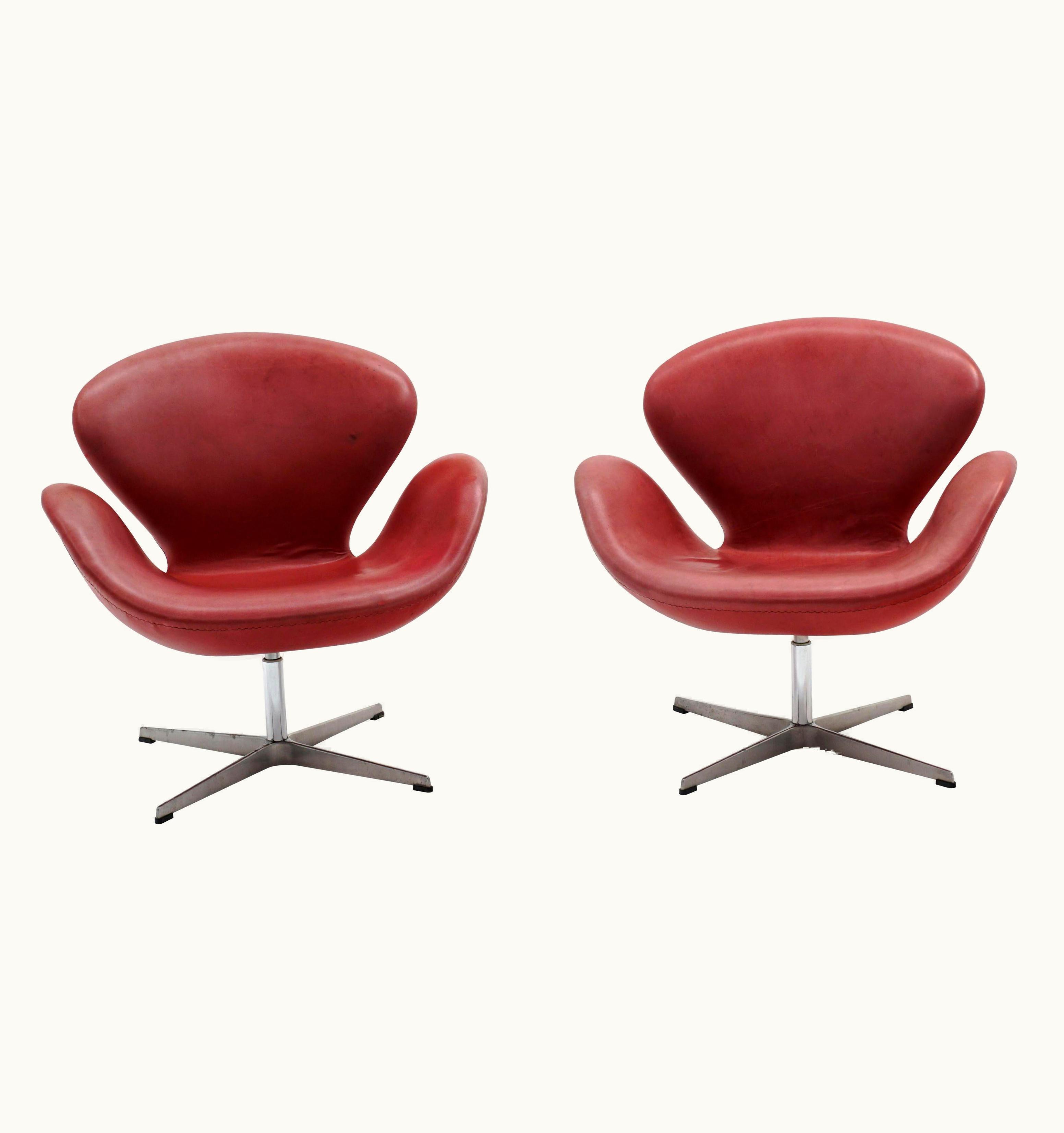 Arne Jacobsen Arne Jacobsen Pair Of Faded Red Leather Swan Chairs By Arne Jacobsen For Fritz Hansen