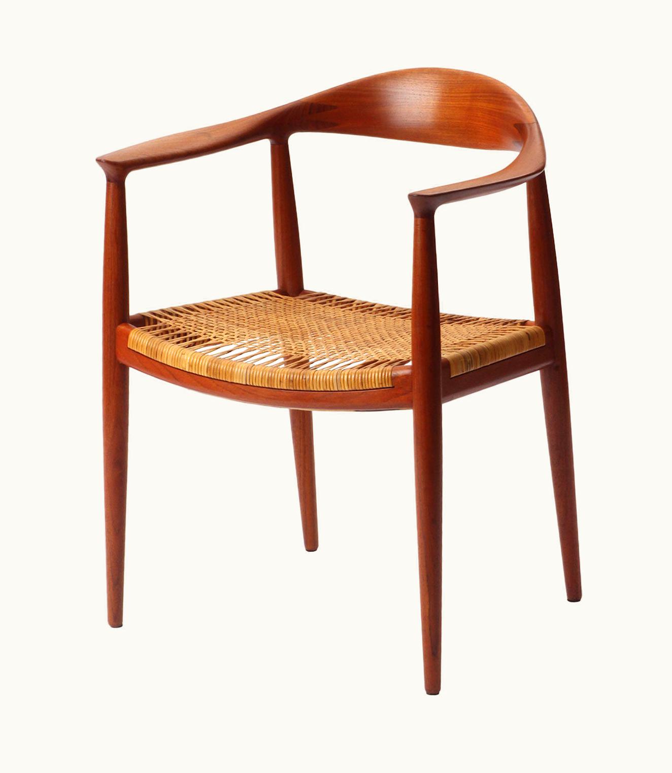 Hans J. Wegner Hans J. Wegner 'The Chair' A Teak Round Chair With A Caned Seat By Hans J. Wegner