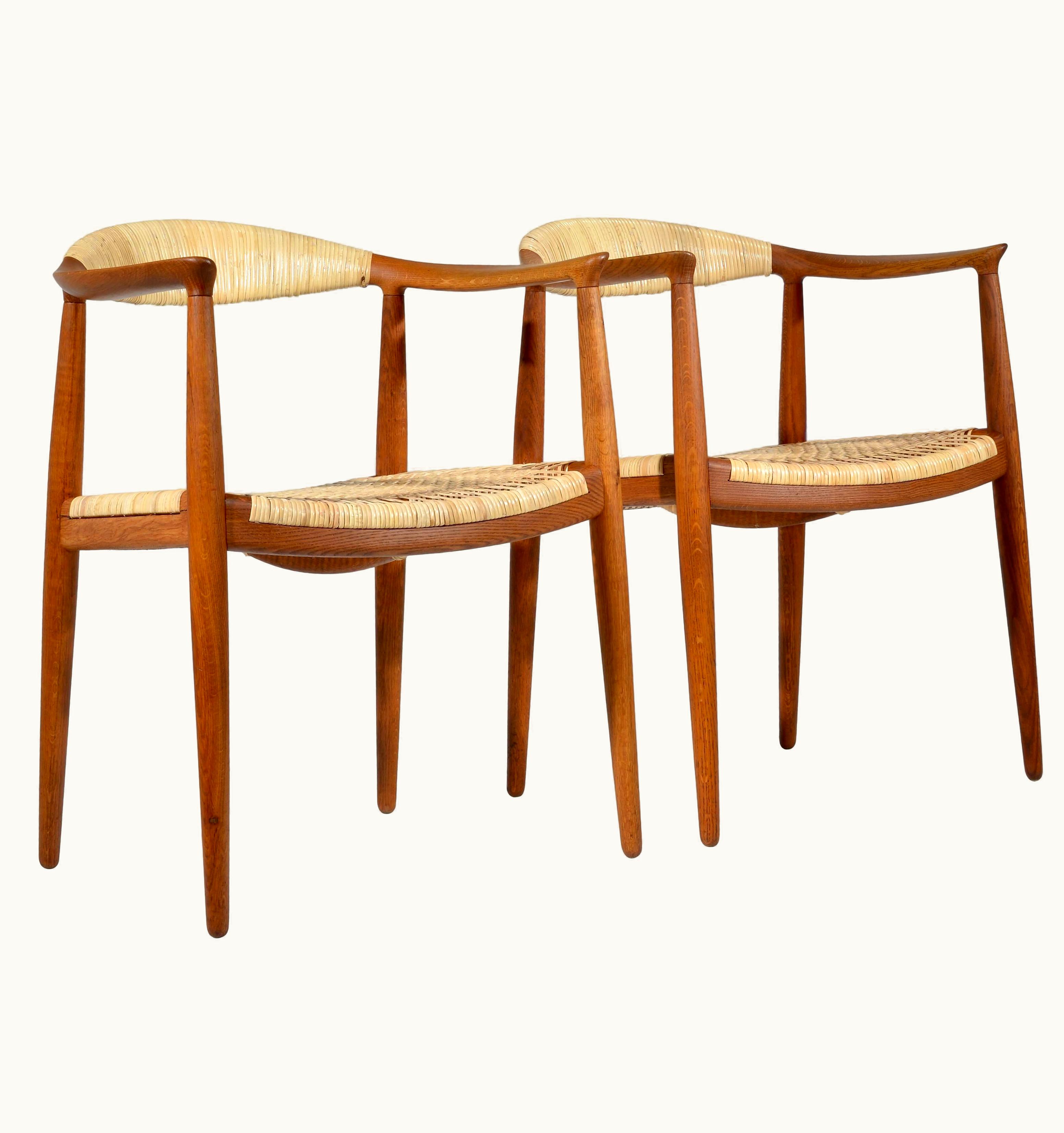 Hans J. Wegner Hans J. Wegner Pair Of Early Oak And Cane Round Chairs By Hans Wegner