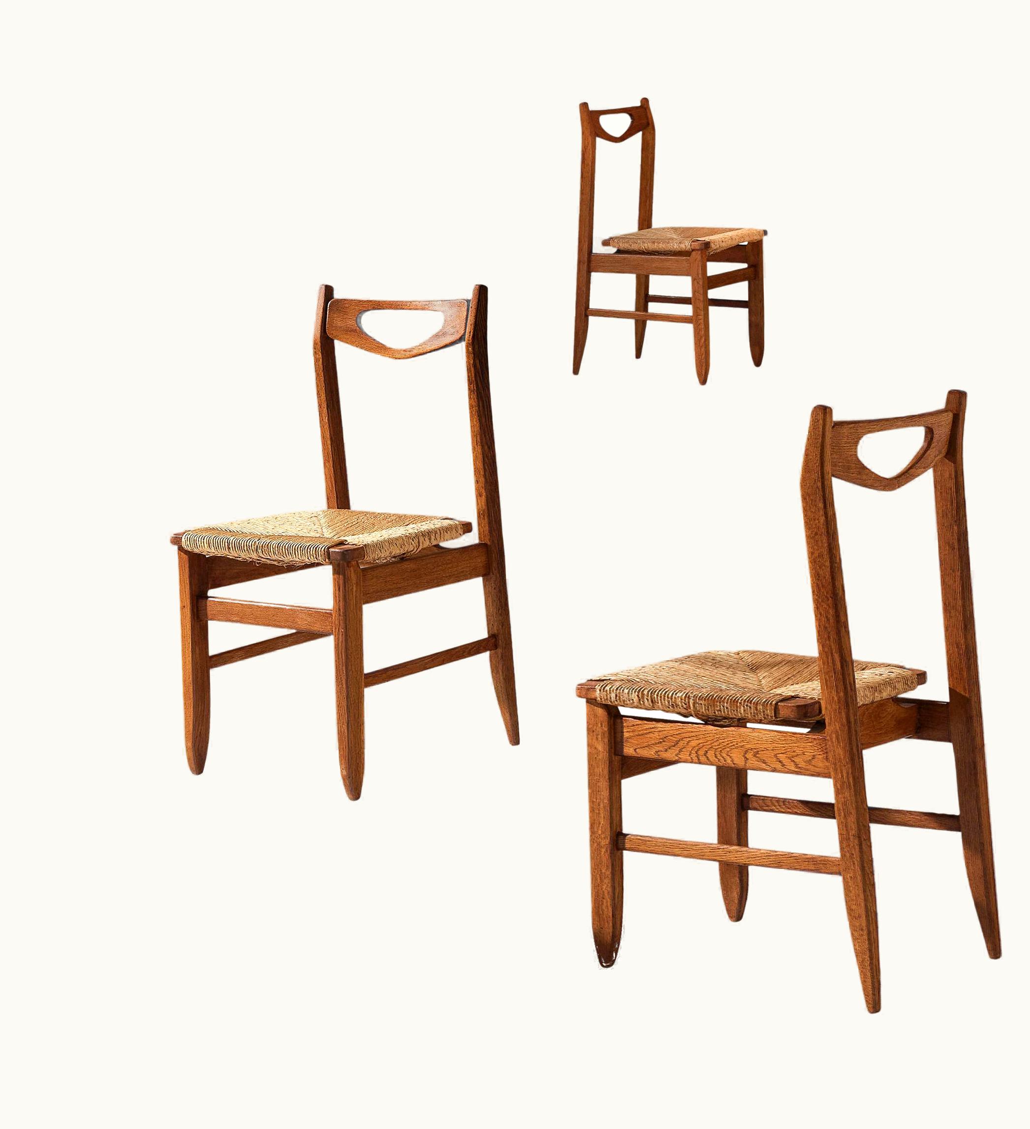 Guillerme et Chambron Guillerme et Chambron Set Of Four Dining Chairs In Oak With Straw Seats