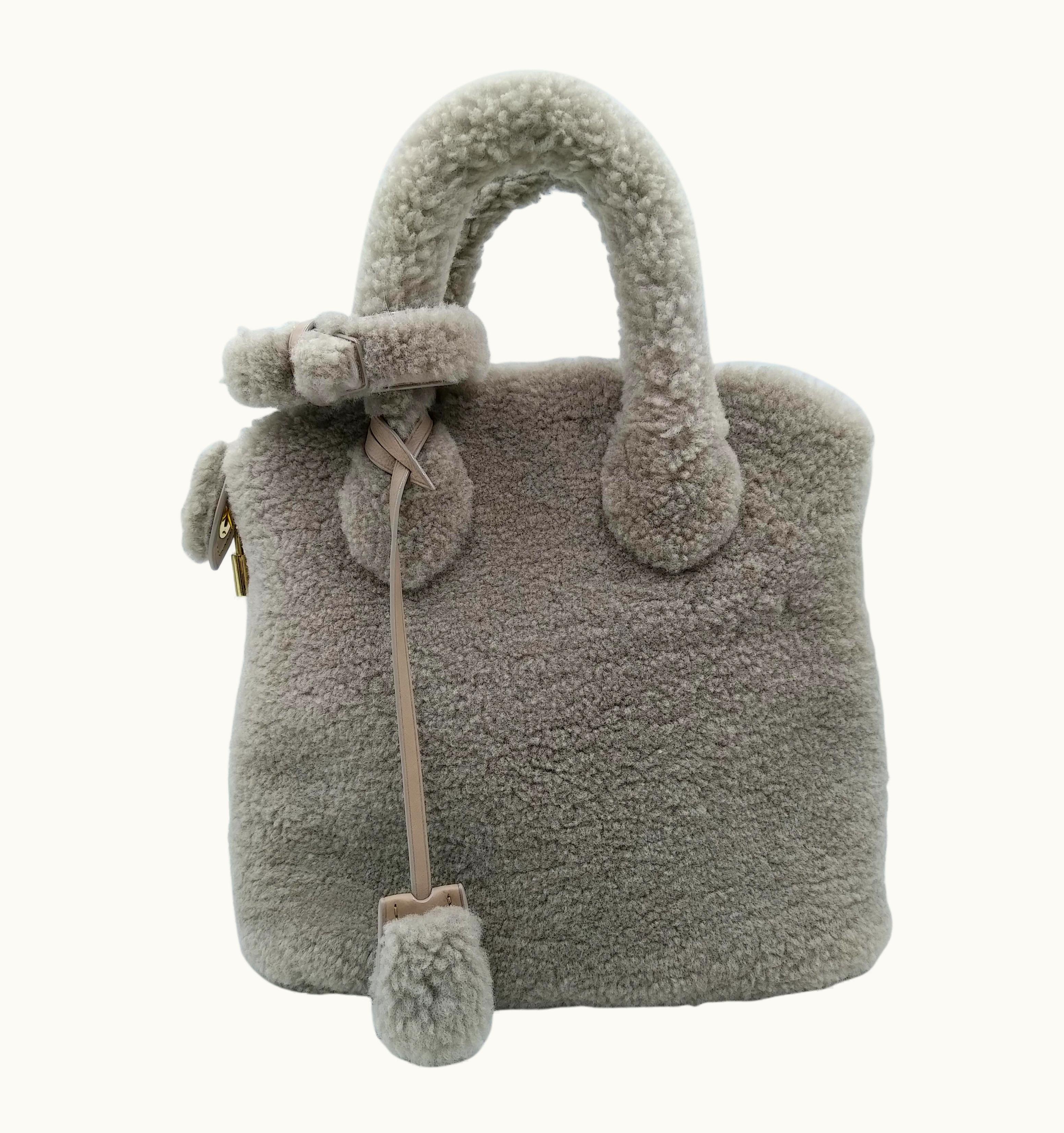 Louis Vuitton 2011 Louis Vuitton Grey Shearling Pulsion Lockit Bag