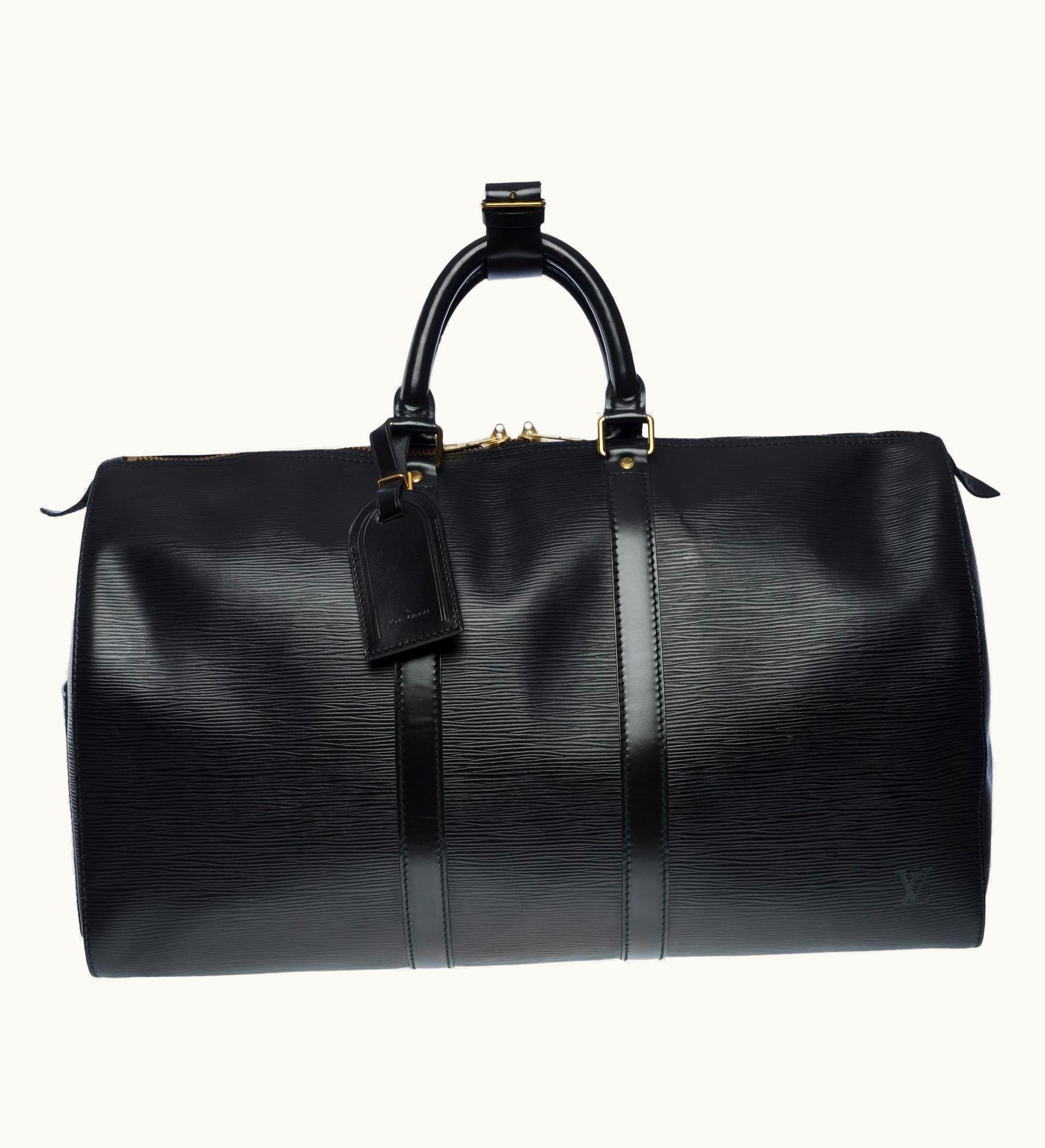 Louis Vuitton The Very Chic Louis Vuitton Keepall 45 Travel Bag In Black épi Leather