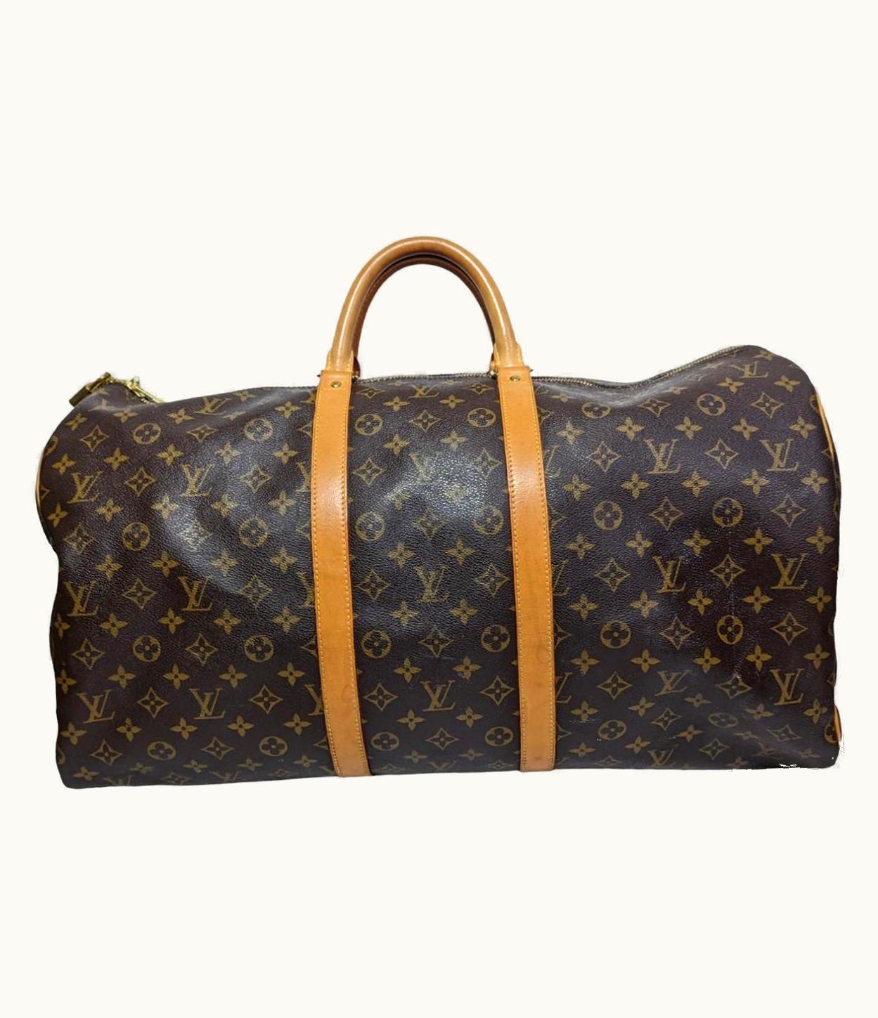 Louis Vuitton Louis Vuitton 2012 Monogram Canvas Keepall 55 Travel Bag