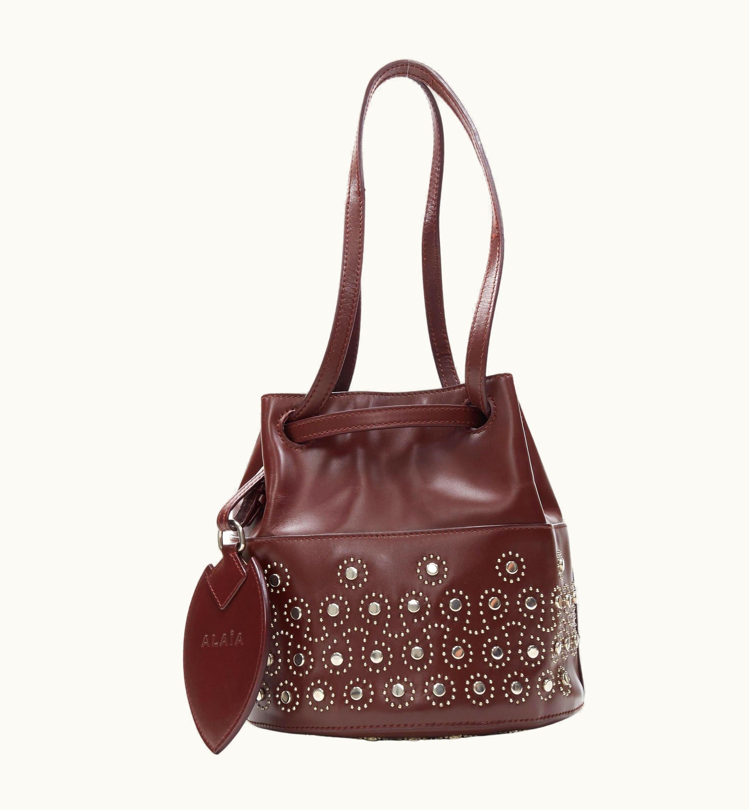 Alaia Alaia Burgundy Red Geometric Silver Studded Drawstring Mirror Charm Bucket Bag