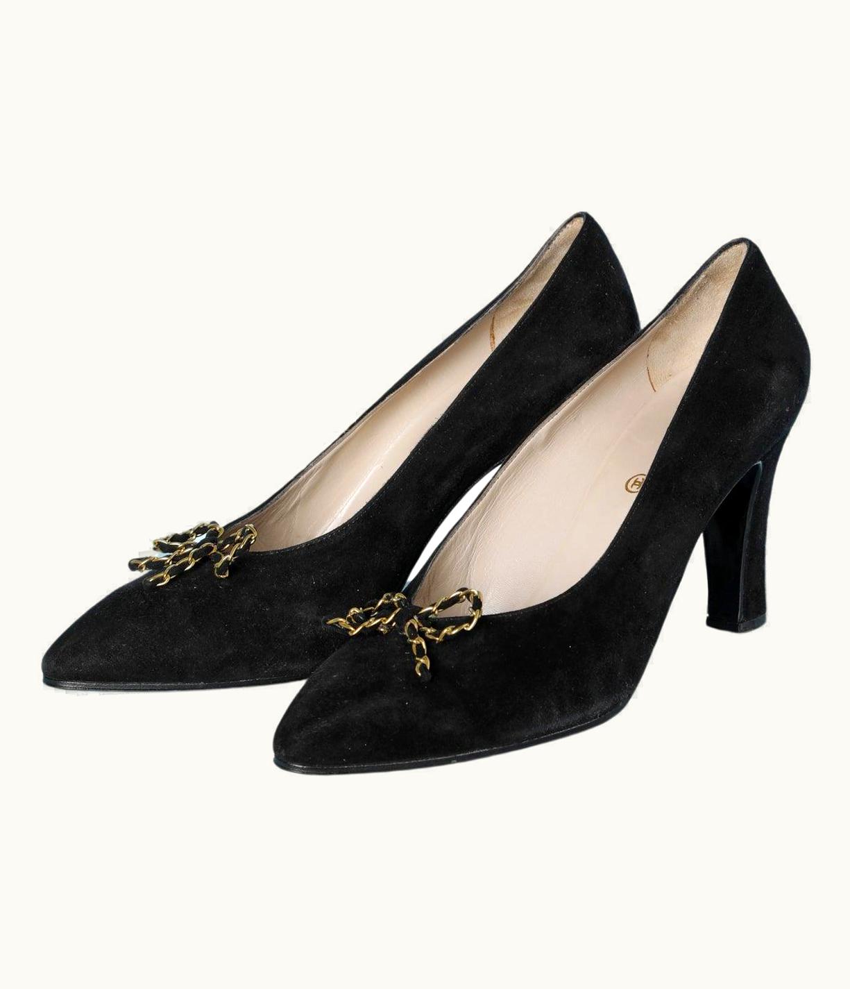 Chanel Black Suede Pump With A Gold Metal Chain And Suede Bow Chanel