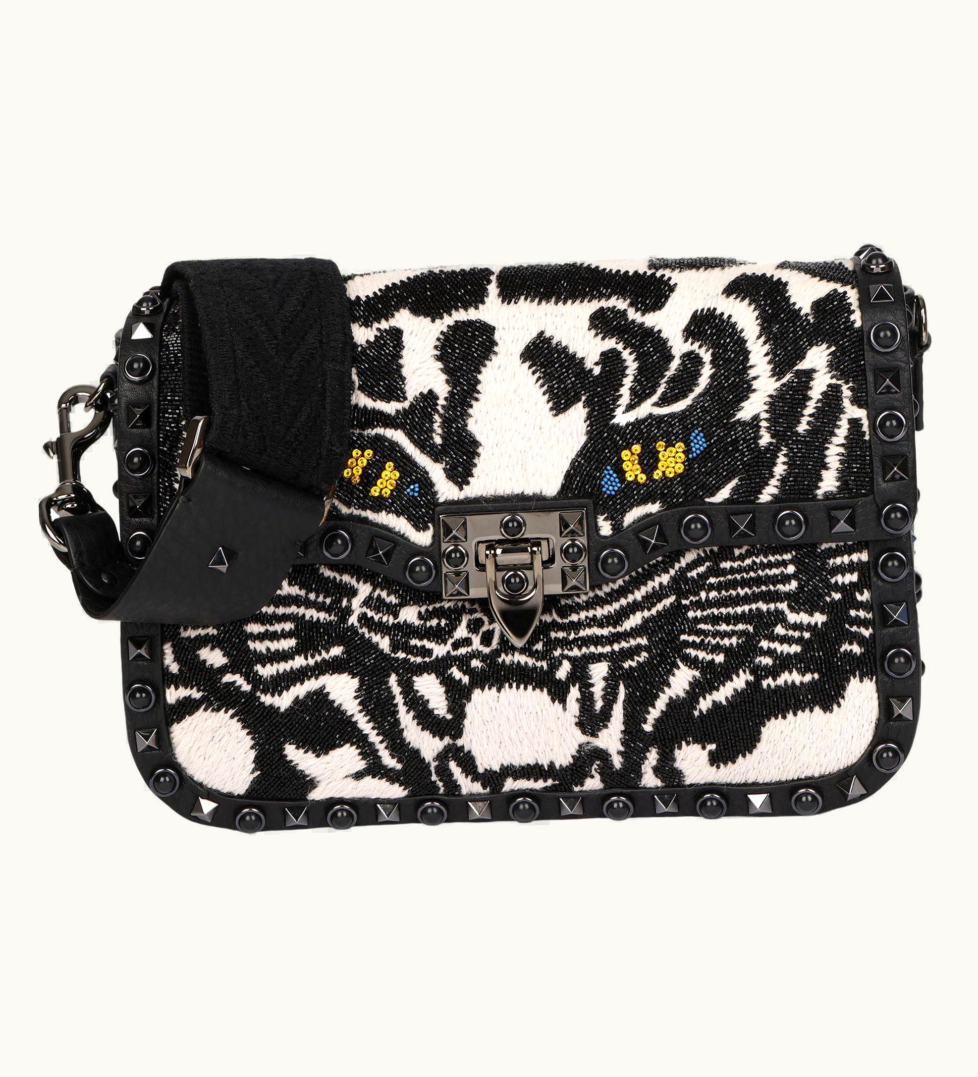 Valentino 2019 Valentino Black Calfskin & Embellishment Tiger Rockstud Rolling Bag