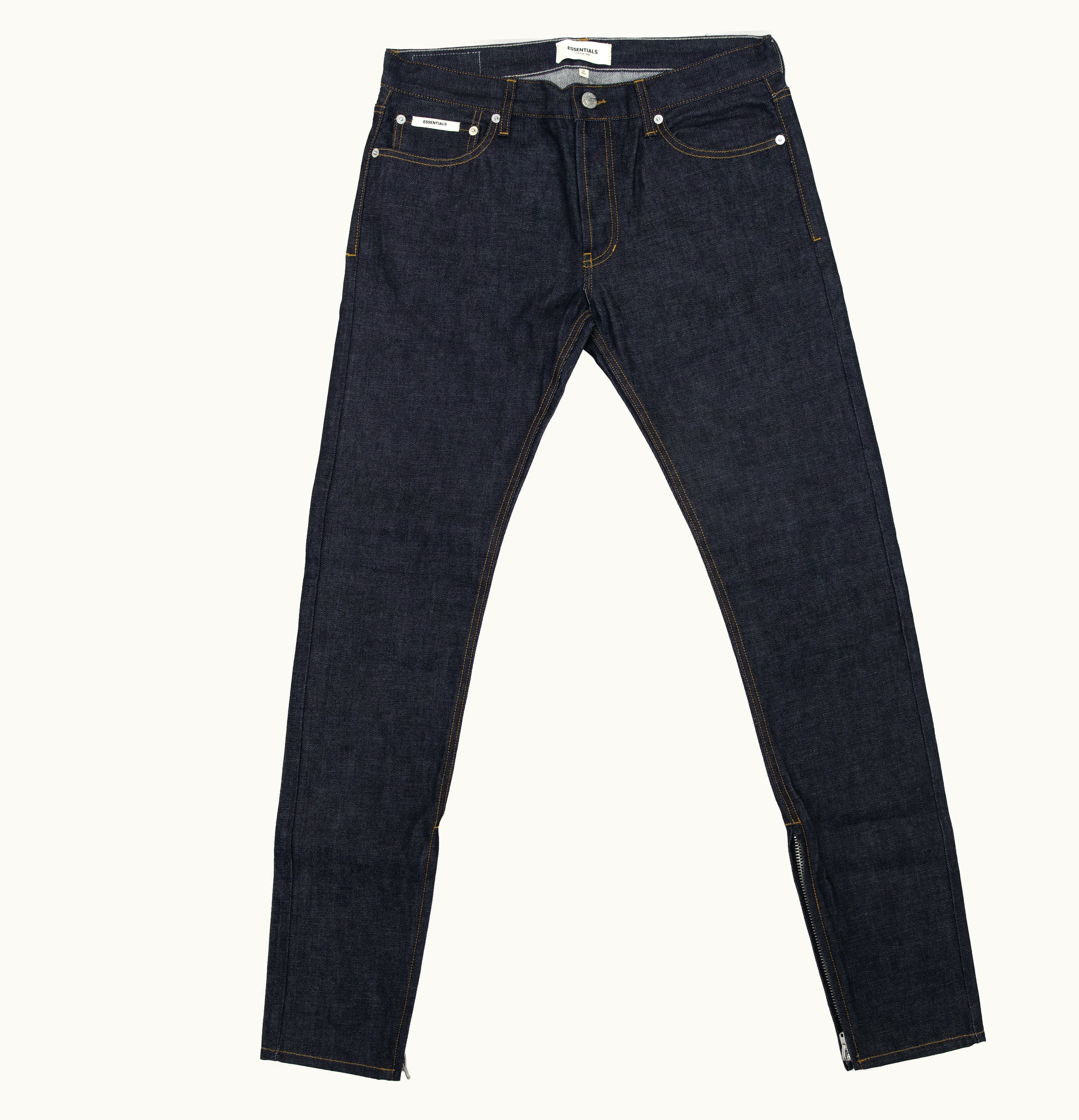 FEAR OF GOD FEAR OF GOD Essentials Raw Denim Tapered Jeans Indigo