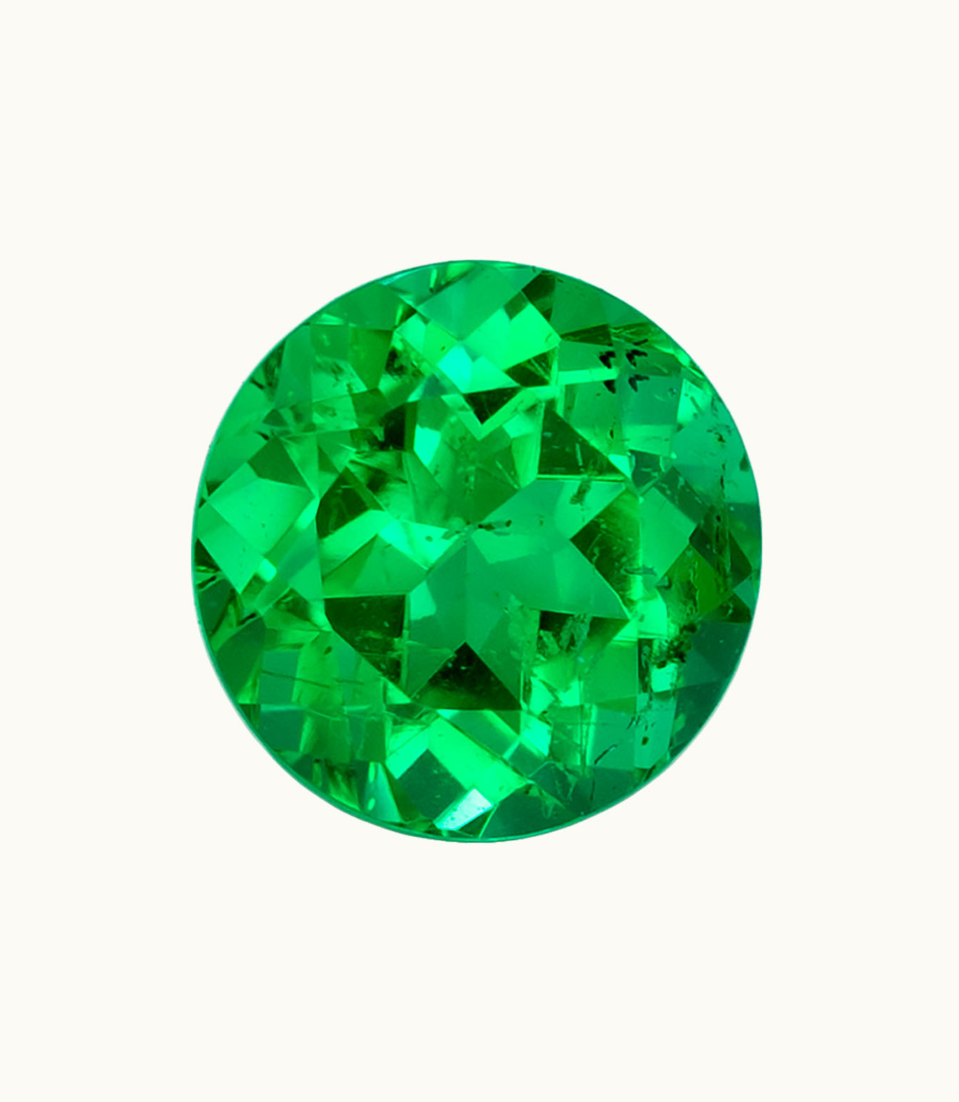 Loose Emerald Round Loose Emerald Intensity Dark - Clarity Slightly Included - Cut Very Good - Shape Round