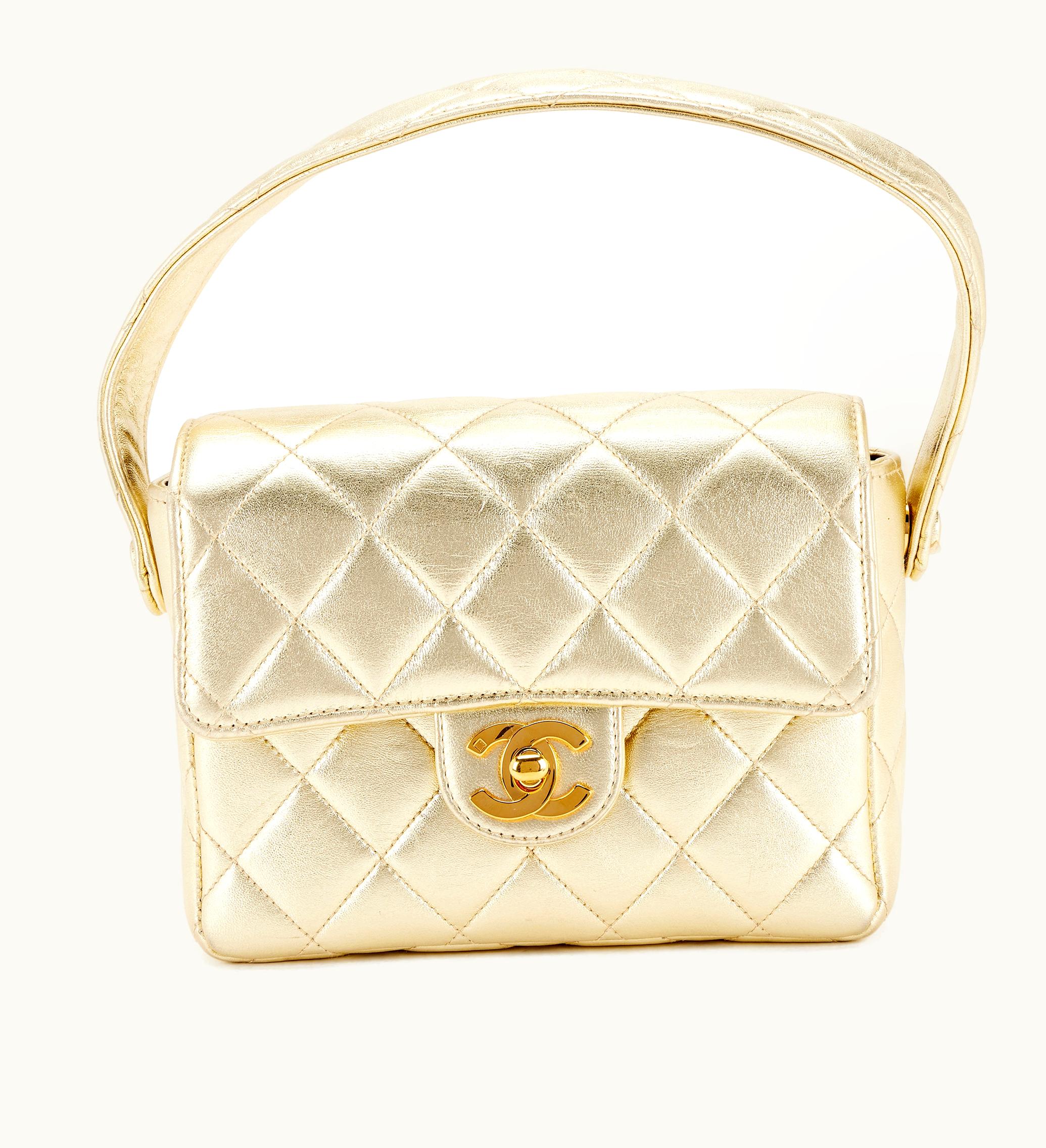 Chanel Chanel Square Mini Top Handle Flap in Metallic Gold Lambskin with Gold Hardware, produced between 1994 and 1996