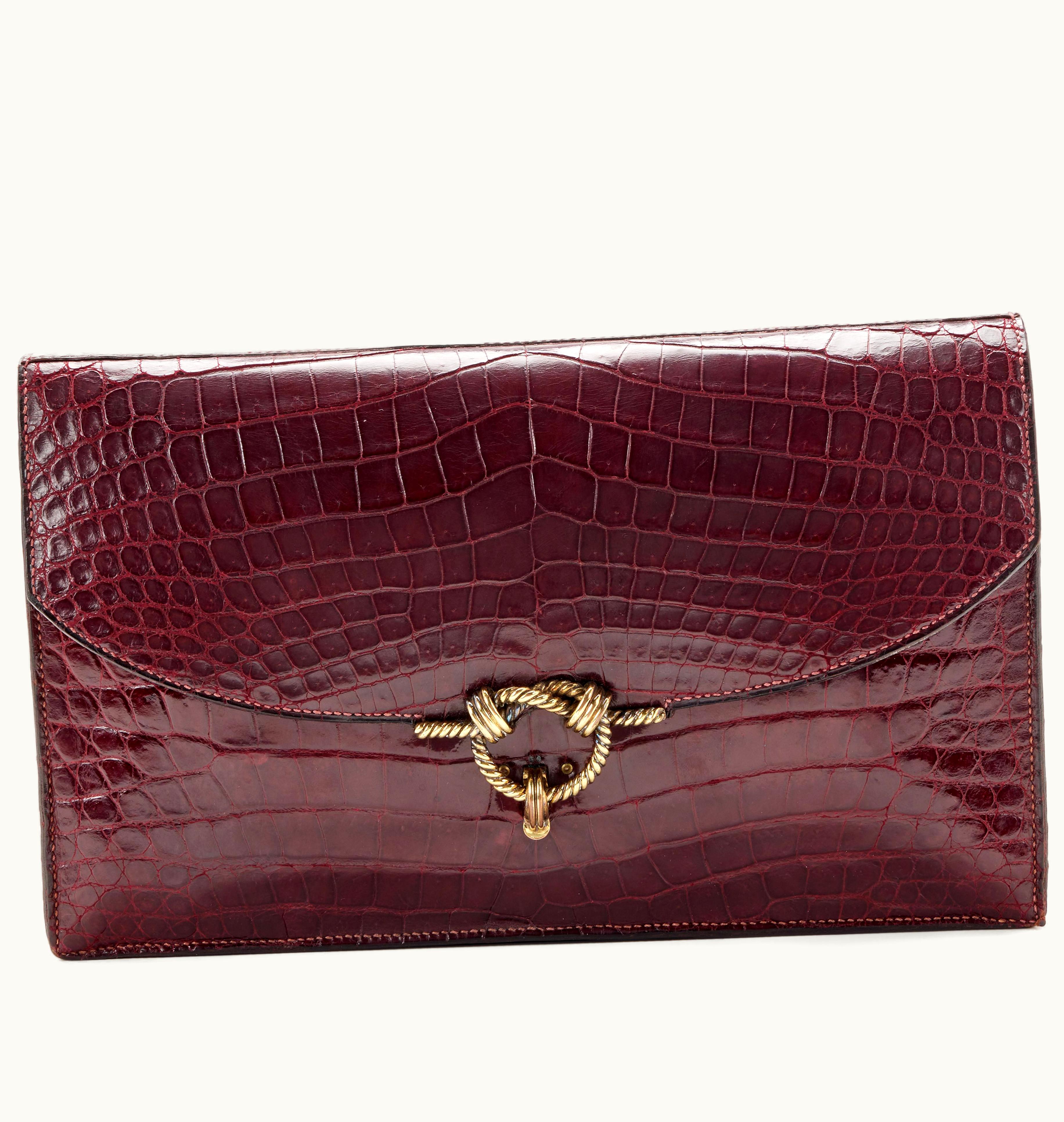 Hermès Hermès Cordeliere Clutch in Gold Hardware, crafted from Burgundy Crocodile, dating back to 1957