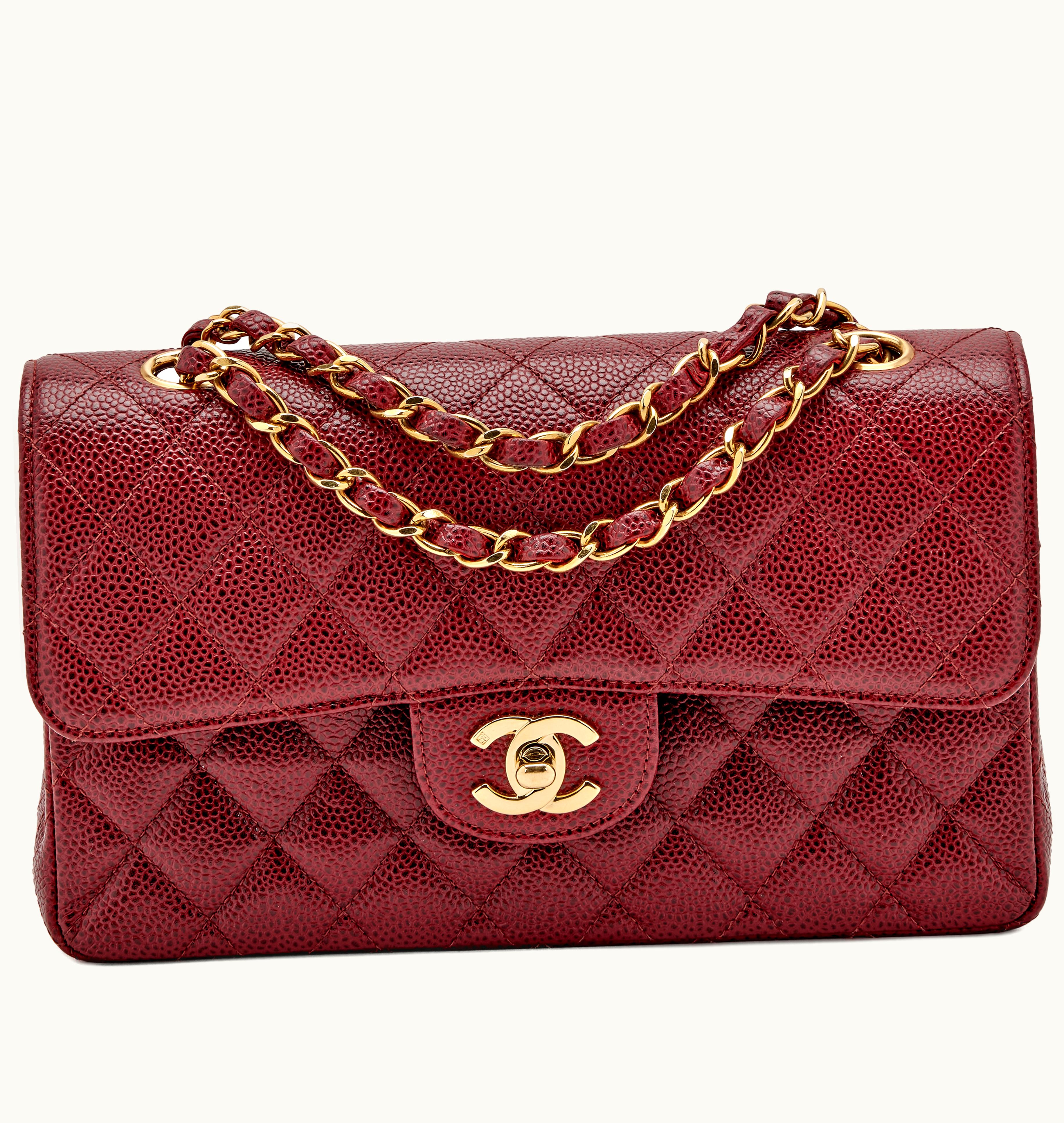 Chanel Chanel Double Flap Bag - Small Size 
Color: Burgundy Red 
Material: Quilted Caviar 
Hardware: Gold 
Era: 2000-2002