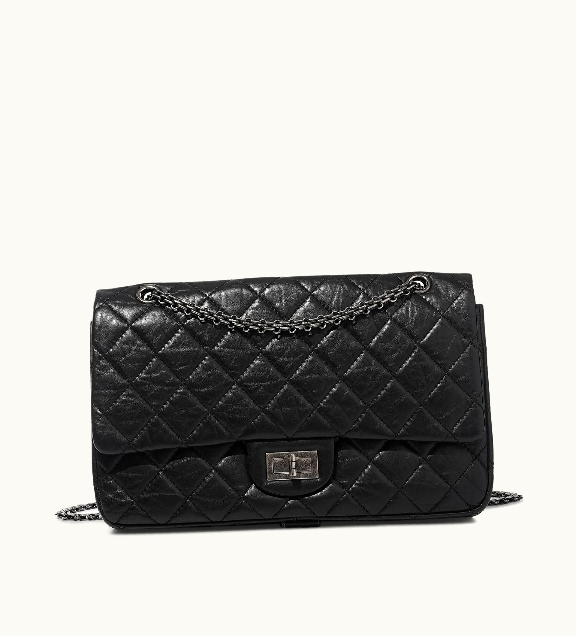 Chanel Chanel 2012 Chanel Maxi 2.55 Flap Bag with Ruthenium Hardware, featuring an elegant Black Quilted Calfskin design