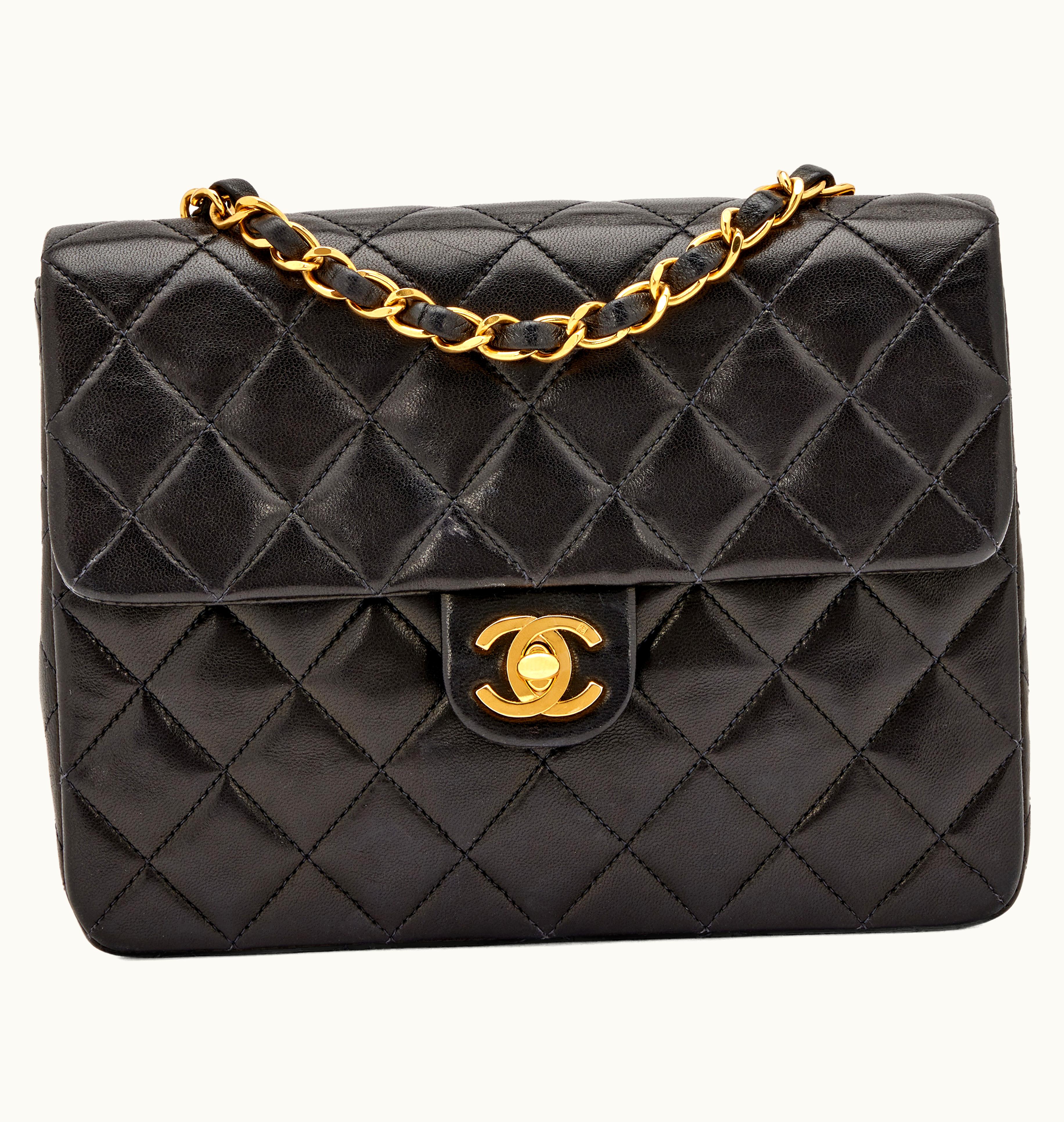 Chanel Chanel Gold Hardware Mini Classic Flap Bag crafted from Black Quilted Lambskin, manufactured between 1991 and 1994