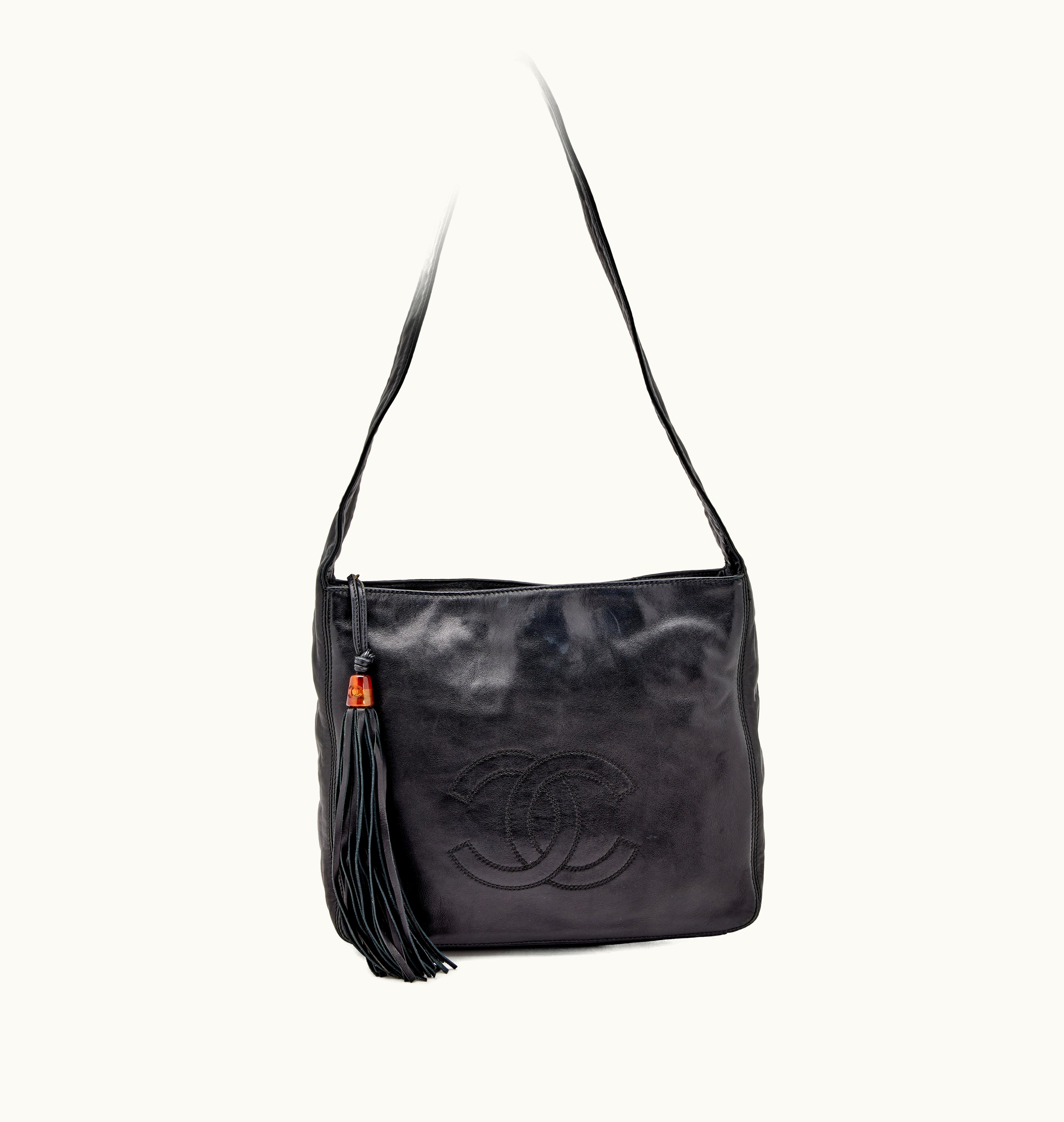 Chanel Chanel Large CC Tassel Hobo Bag with Gold Hardware in Black Lambskin, produced in 1996-1997