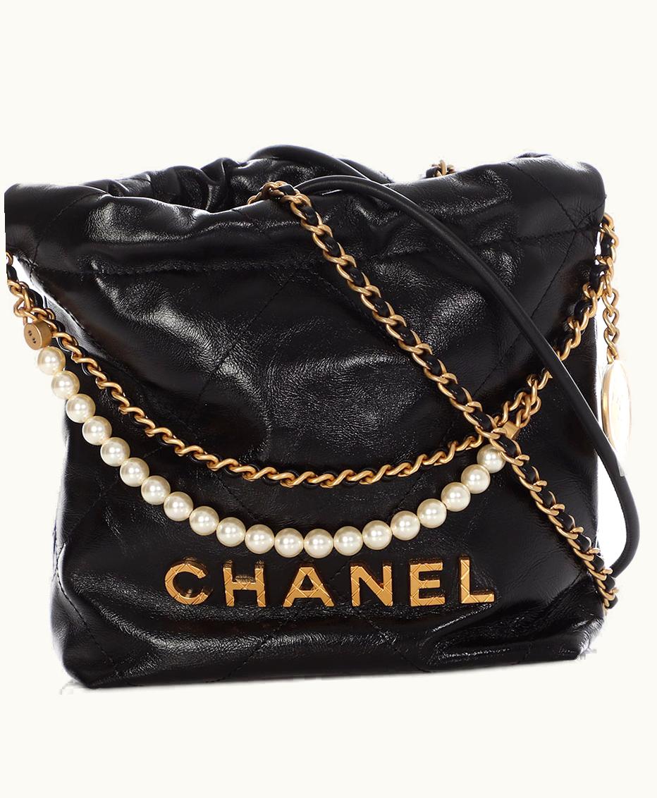Chanel Chanel 2023 Chanel 22 Mini Hobo in Glazed Calfskin with Black Quilted Design, adorned with a Pearl Strap and Gold Hardware