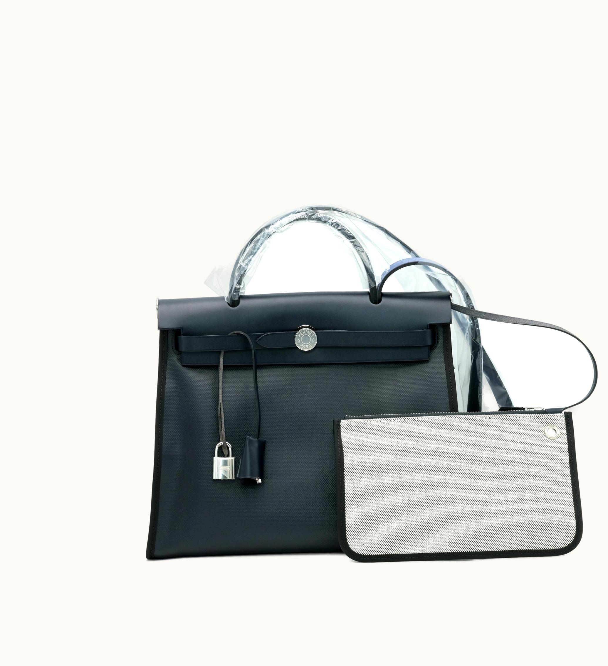 Hermès Hermès 2023 presents the Hermès Caban Vache Hunter accompanied by the H Berline Canvas Herbag Zip 31 Palladium Hardware