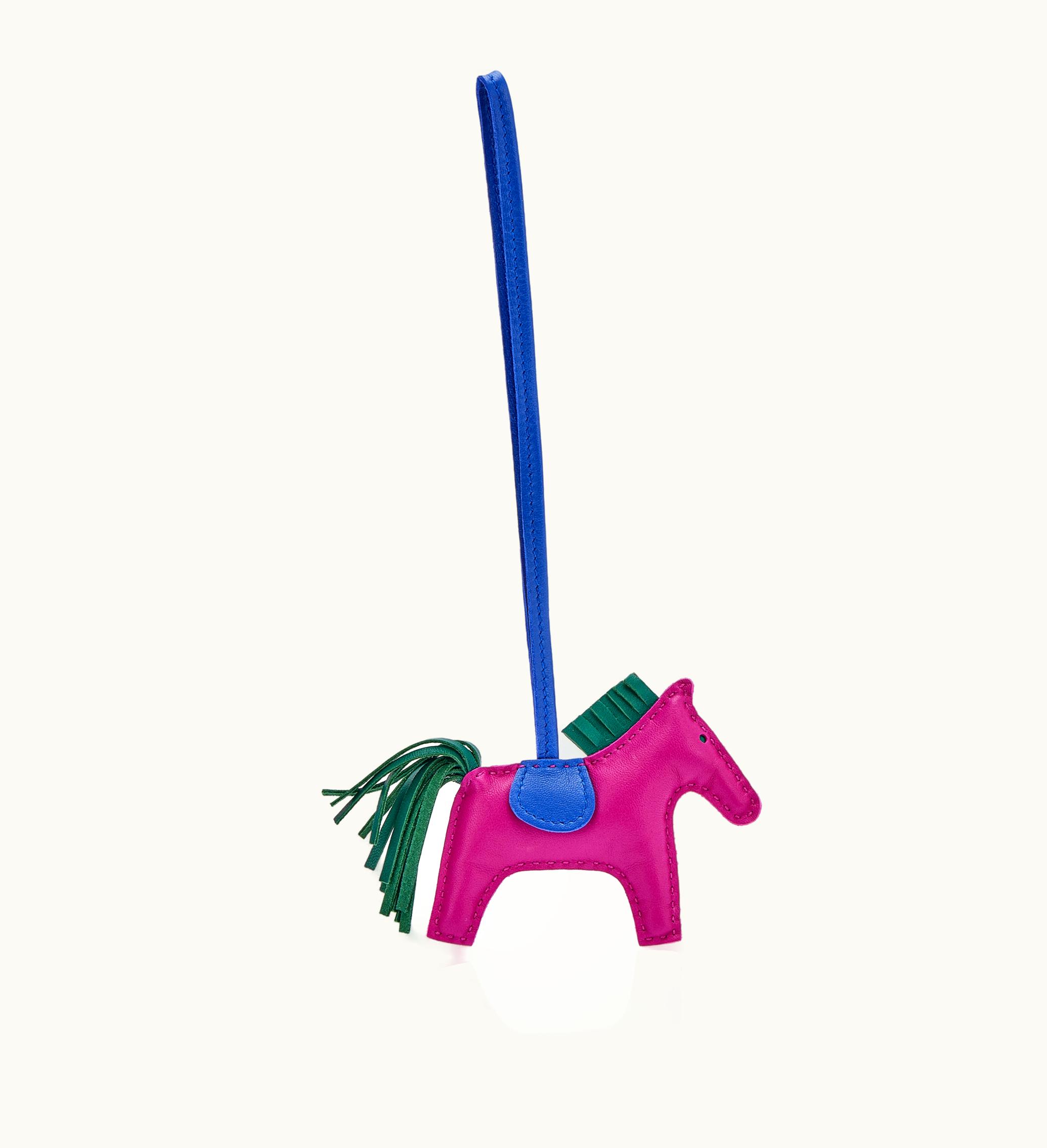 Hermès Hermès Rodeo Charm PM, 2017 in Malachite Milo Lambskin with Rose Pourpre and Blue Electric