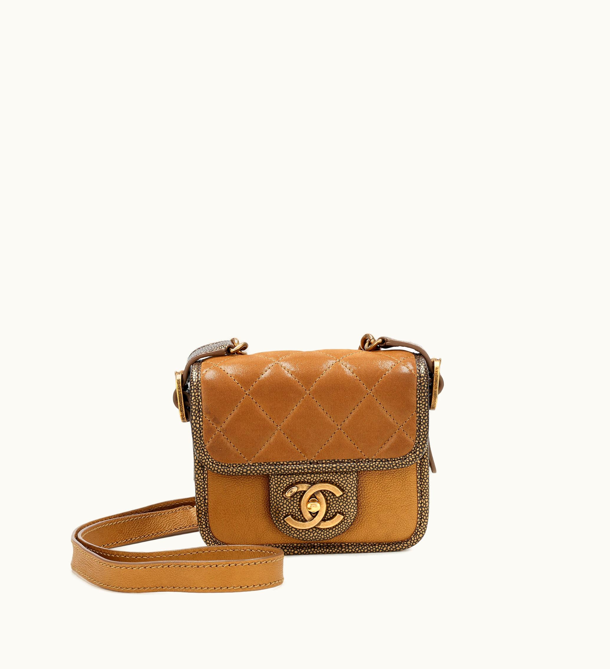 Chanel Chanel Gold Quilted Iridescent Calfskin and Caviar Paris-Bombay Mini Backpack with Gold Hardware, released in 2012