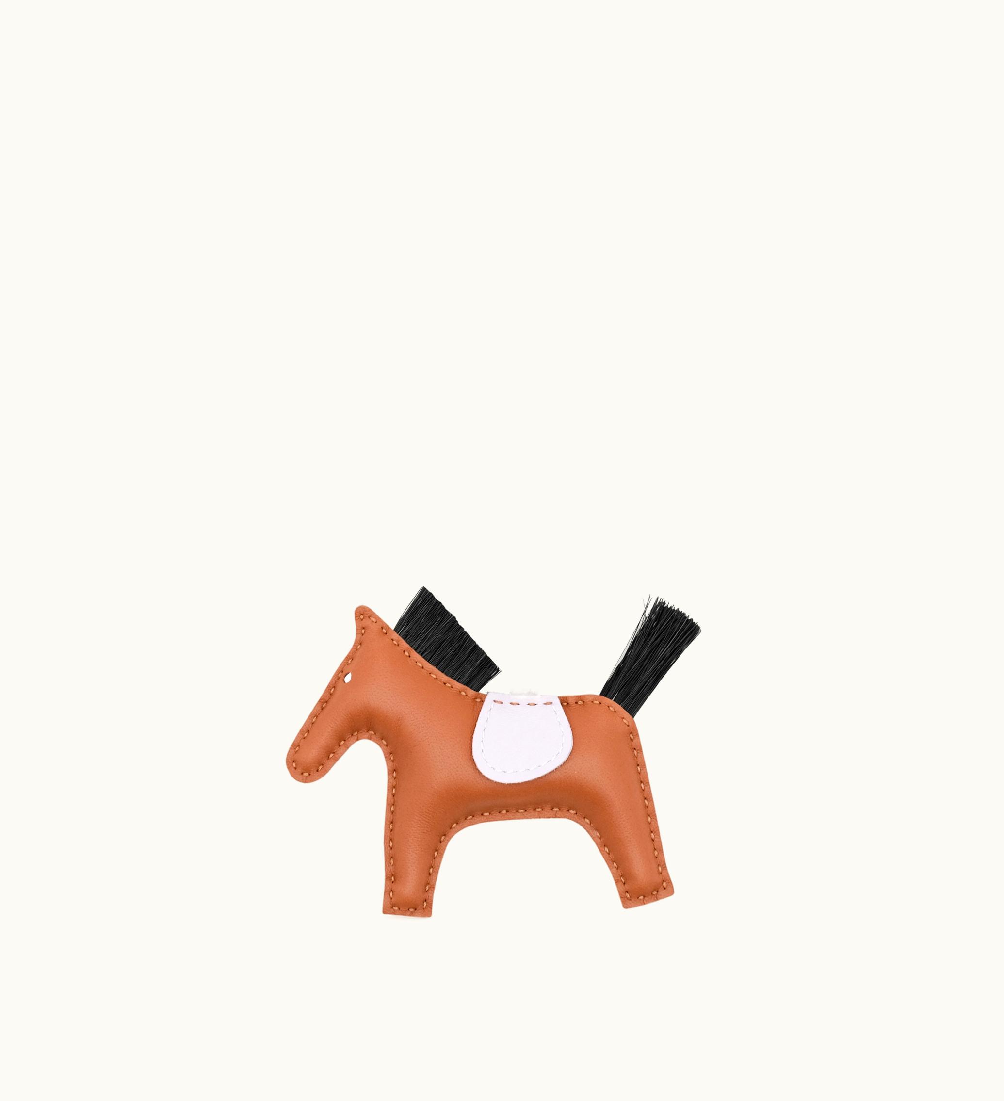 Hermès Hermès 2023 Hermès Gold, Mauve Pale, and Black Milo Lambskin and Swift GriGri Rodeo Charm PM