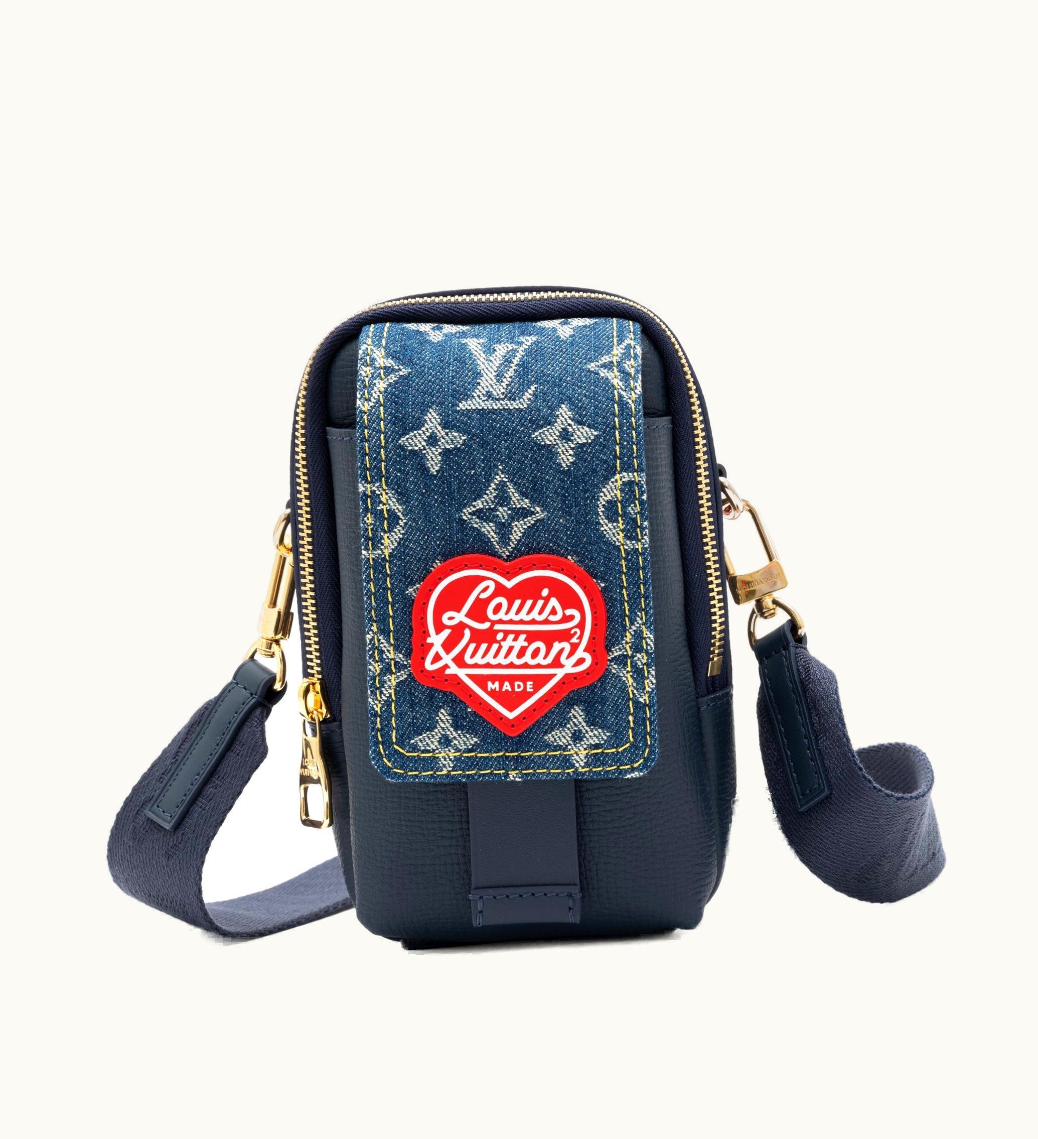 Louis Vuitton 2021 brings us the exquisite Louis Vuitton Virgil Abloh NIGO Blue Monogram Denim & Leather Flat Double Phone Pouch with Gold Hardware