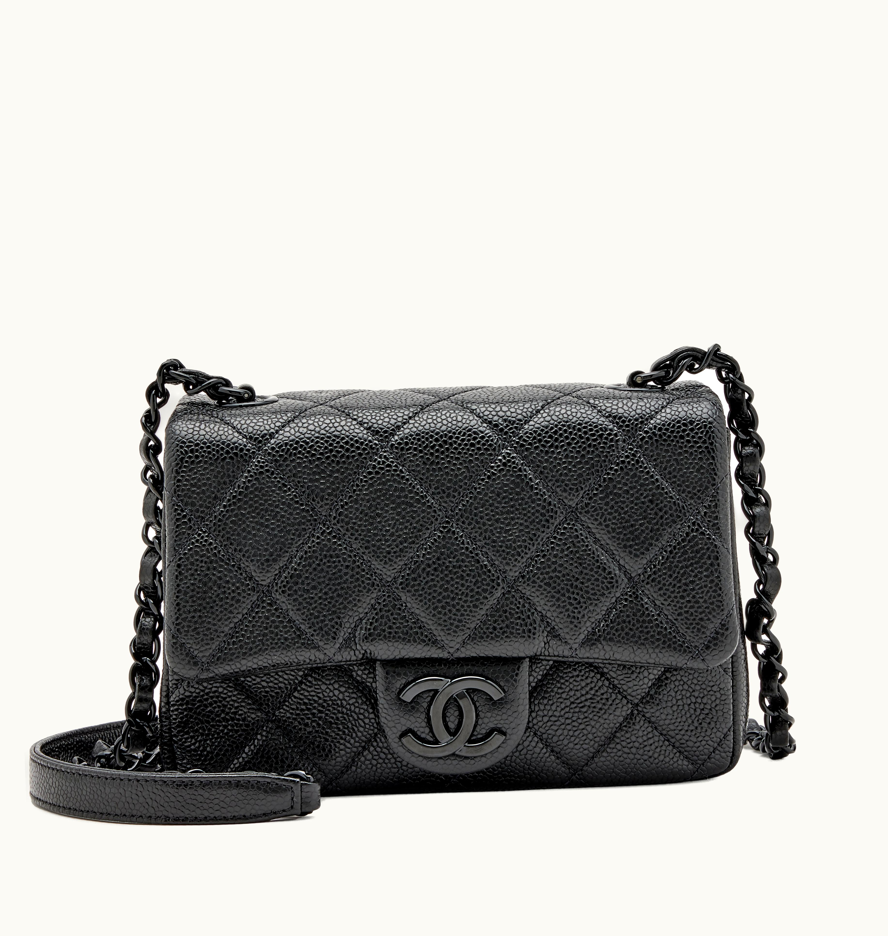 Chanel Chanel 2019 Incognito Mini Square Flap Bag, featuring a black quilted caviar exterior and adorned with black hardware