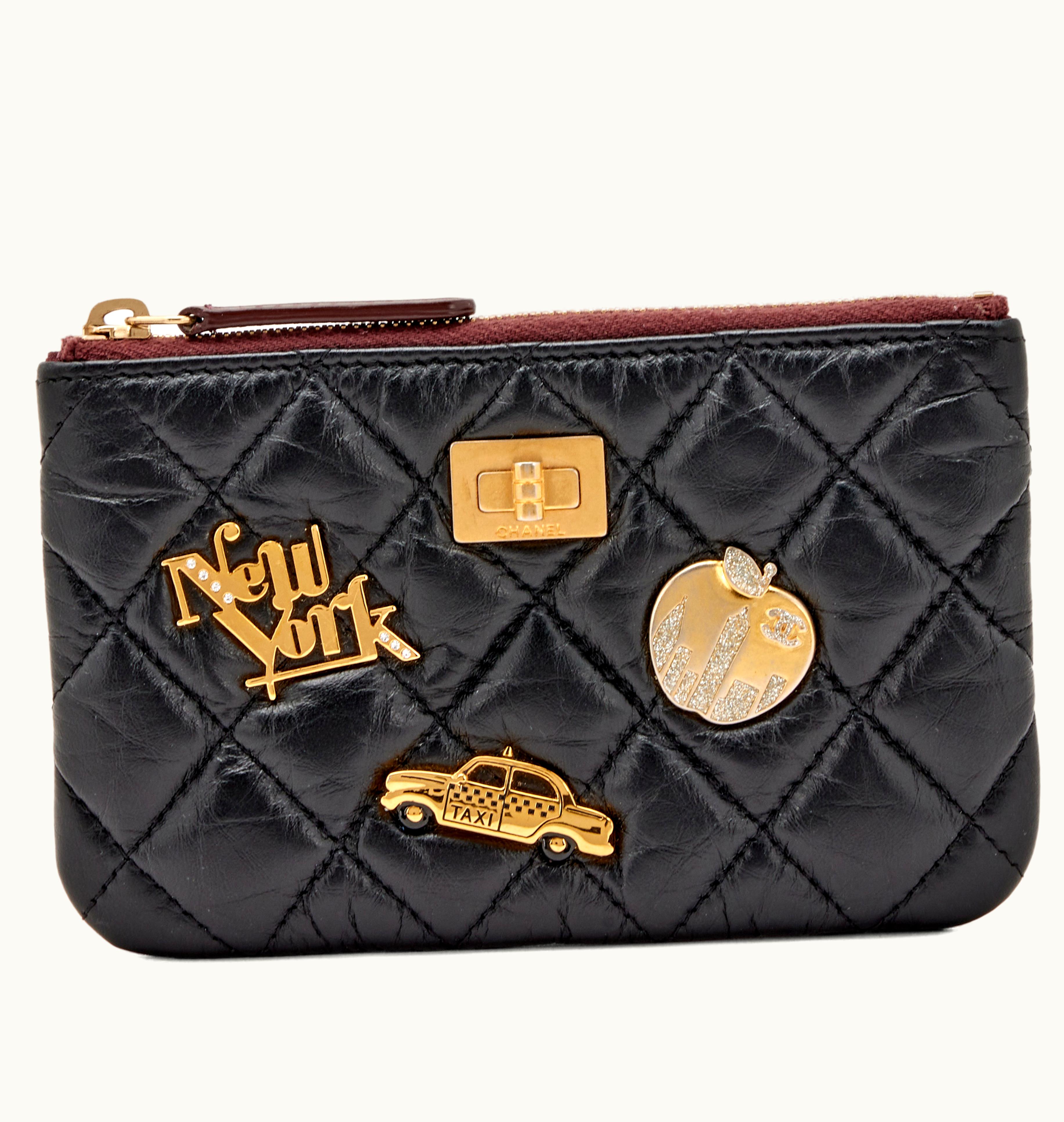 Chanel Chanel Aged Calfskin New York Lucky Charms Reissue Classic Mini O Case Pouch Gold Hardware, 2018 - Quilted in Black