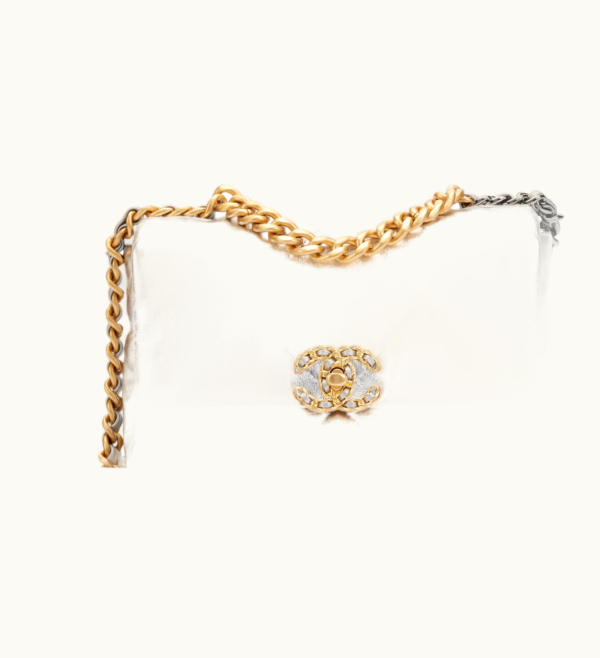 Chanel Chanel Medium 19 in 2021 features a stylish silver quilted lambskin material with a mix of gold and silver hardware
