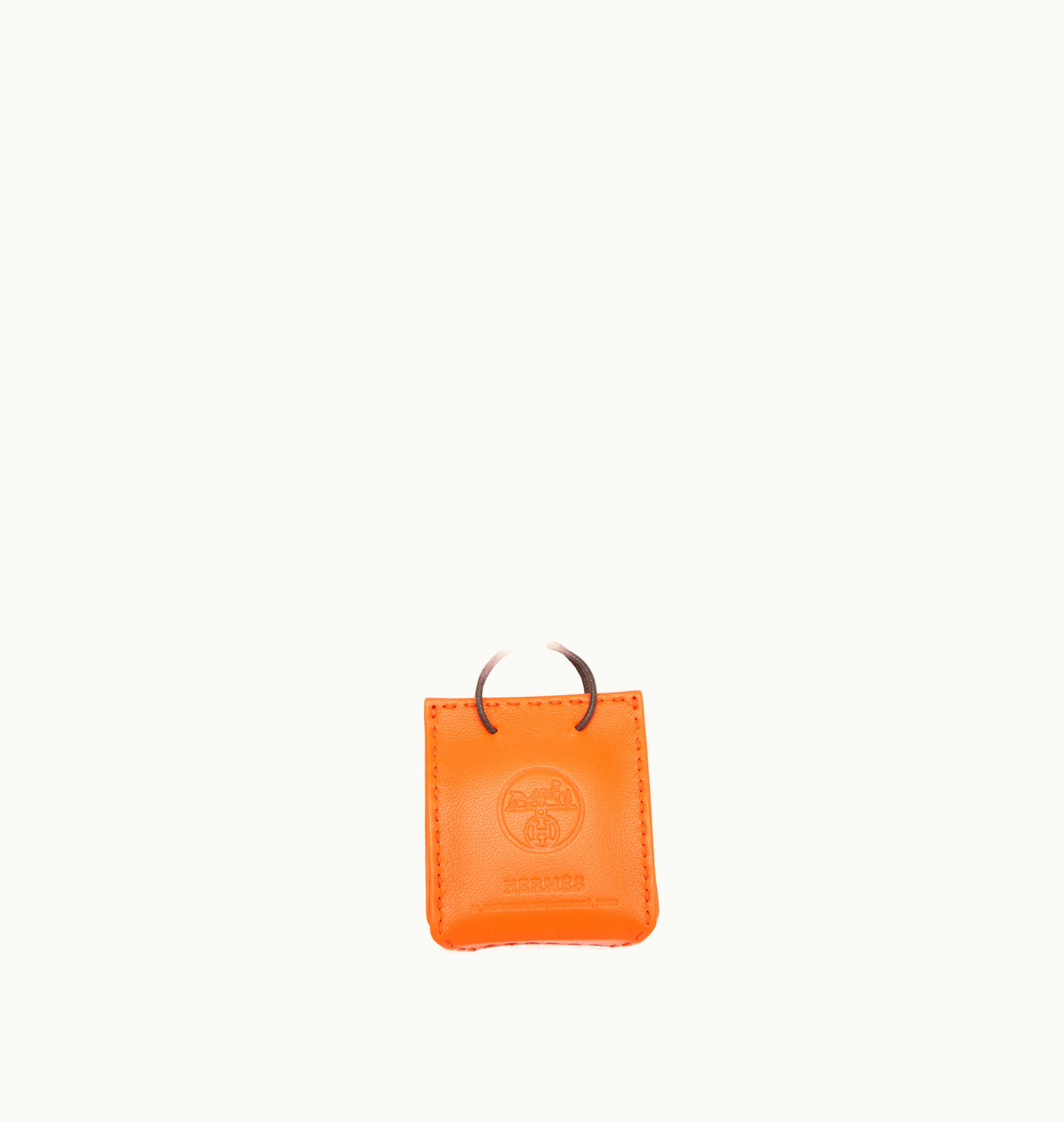 Hermès Hermès 2020 introduces the Hermès Feu Milo and Gold Swift Mini Shopping Bag Charm as an exquisite addition