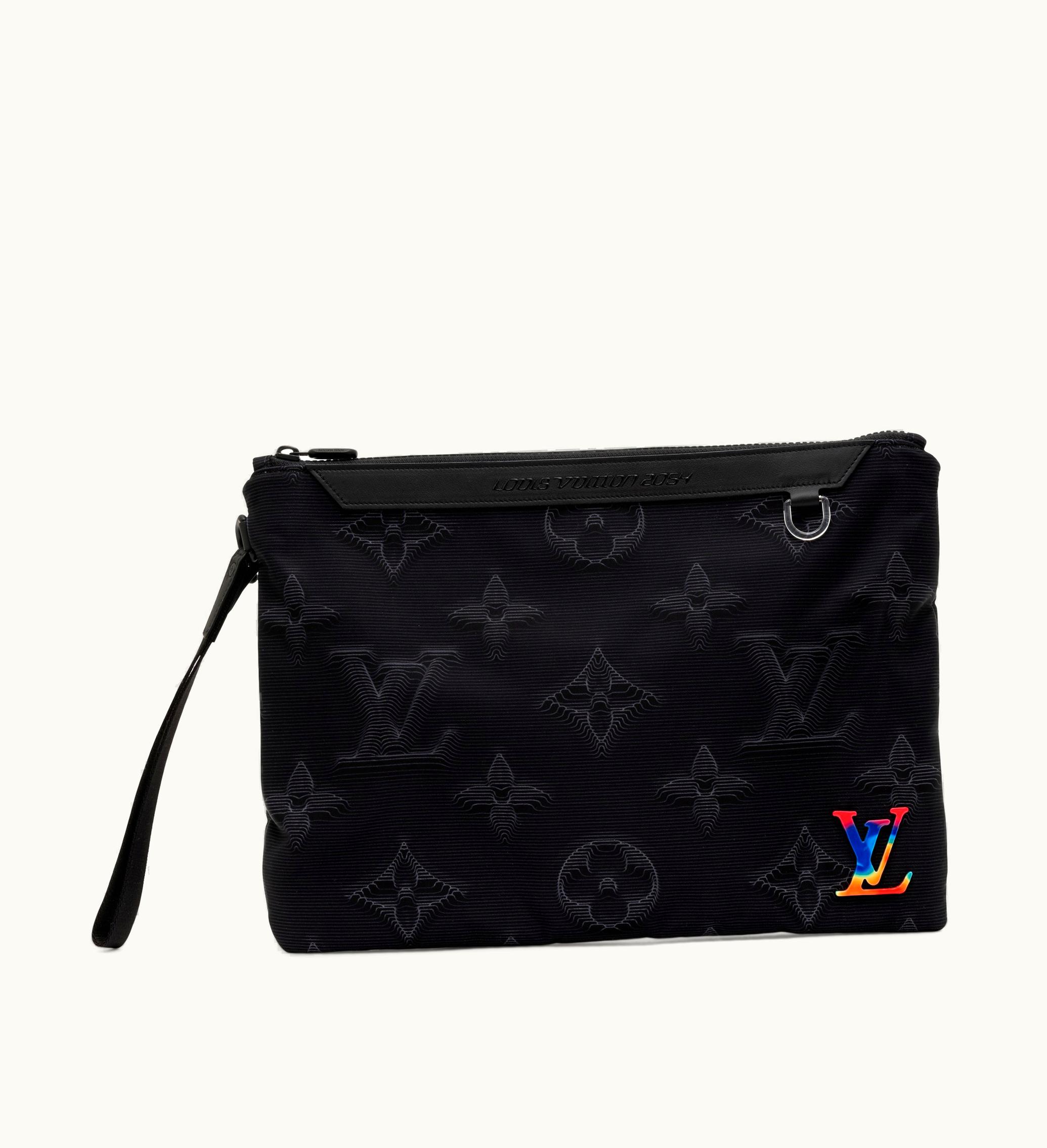 Louis Vuitton Louis Vuitton's Virgil Abloh unveils an exceptional creation - the remarkable Black & Green Monogram 3D Nylon 2054 Reversible Pouch, pristine for the year 2020