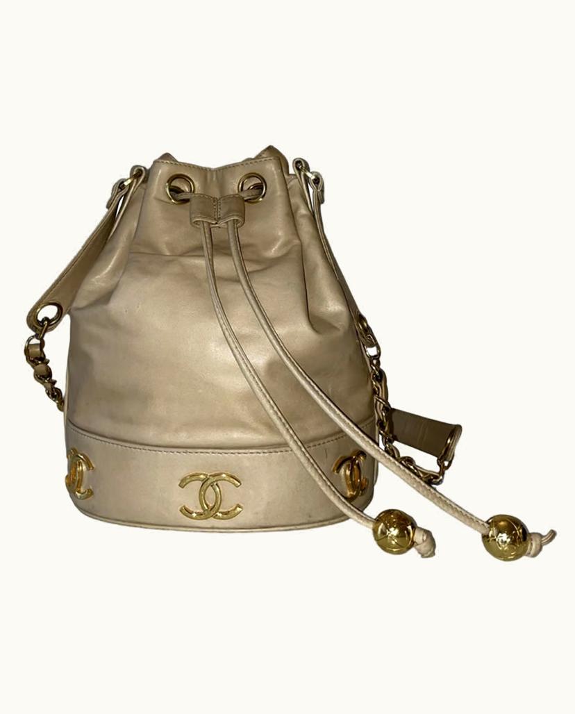 Chanel Chanel Pochette Women's Leather Purse in Beige