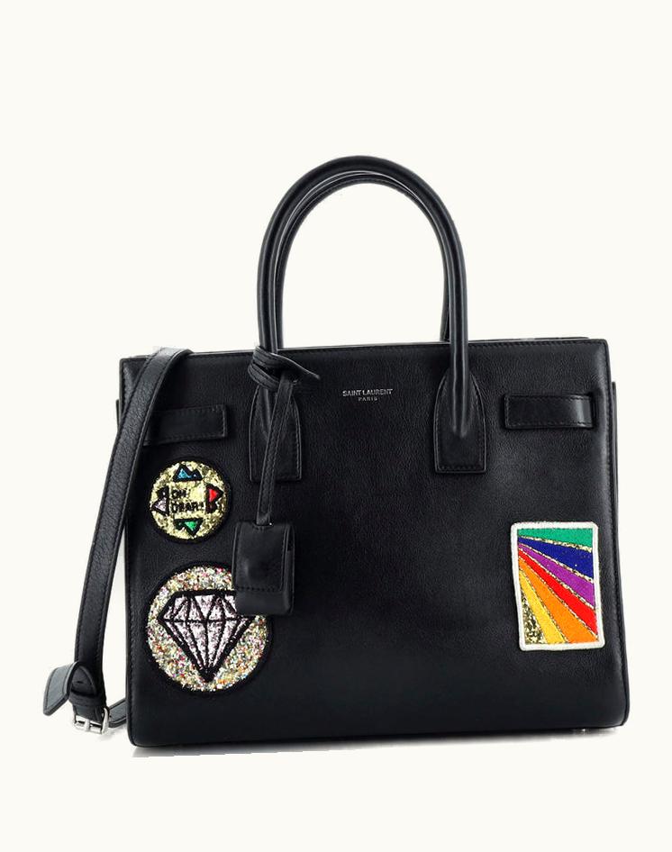 Saint Laurent Saint Laurent Sac De Jour NM Bag Patch Embellished Leather Baby in Black