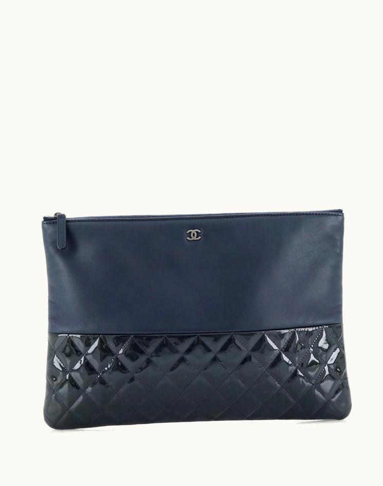 Chanel Chanel O Case Clutch Lambskin And Quilted Patent Large