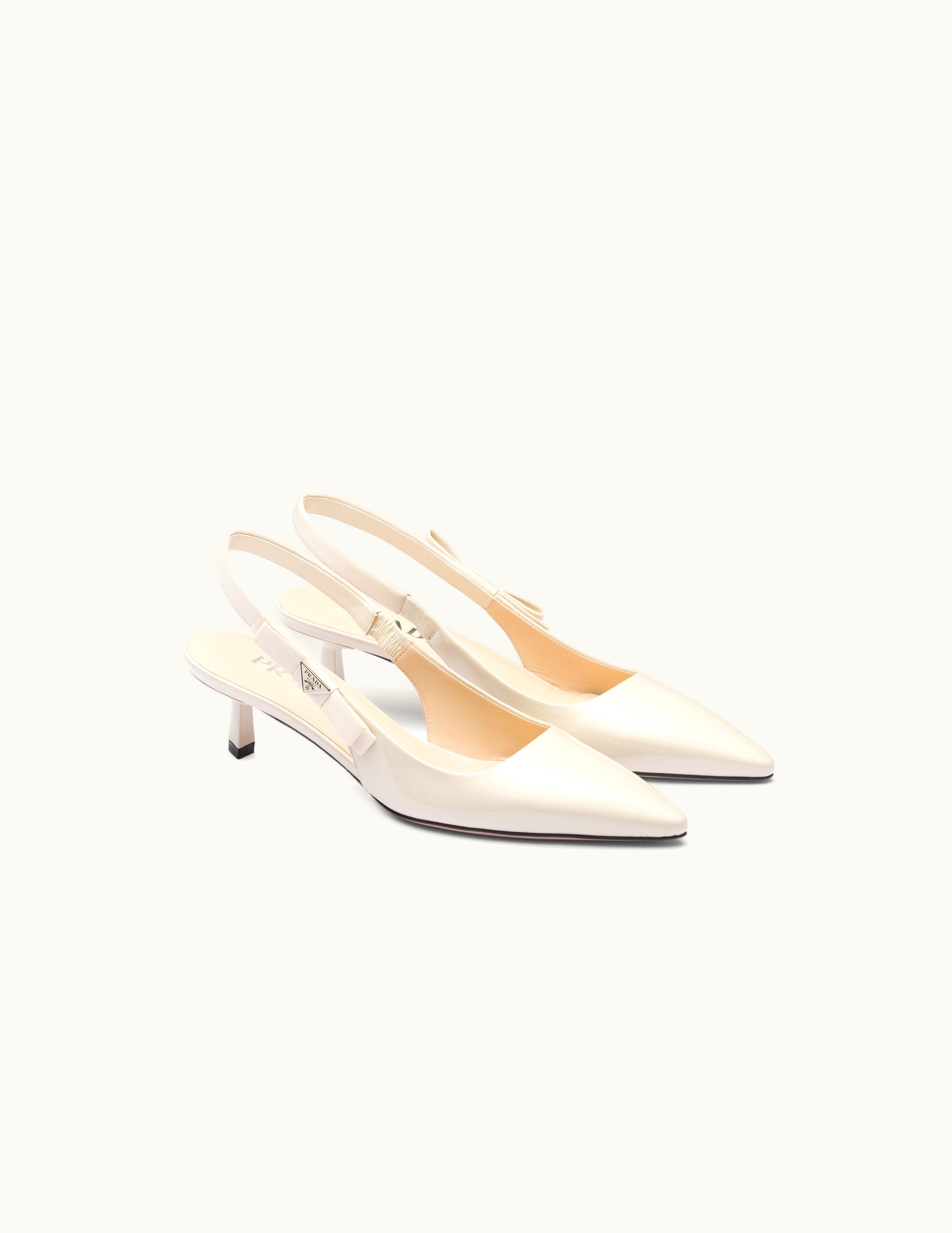 Prada Prada Ivory Patent Leather Slingbacks