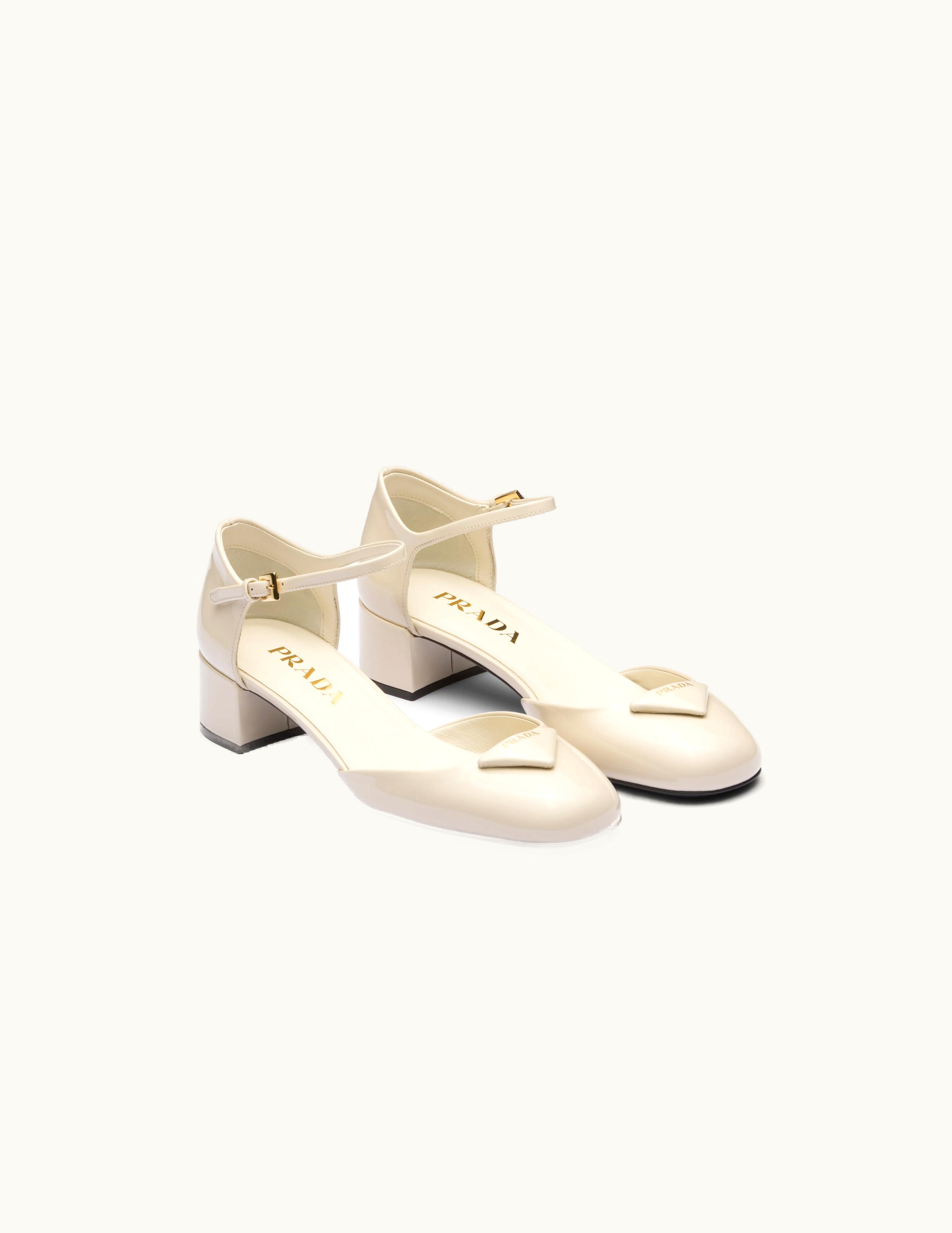 Prada Prada Ivory Patent Leather Pumps