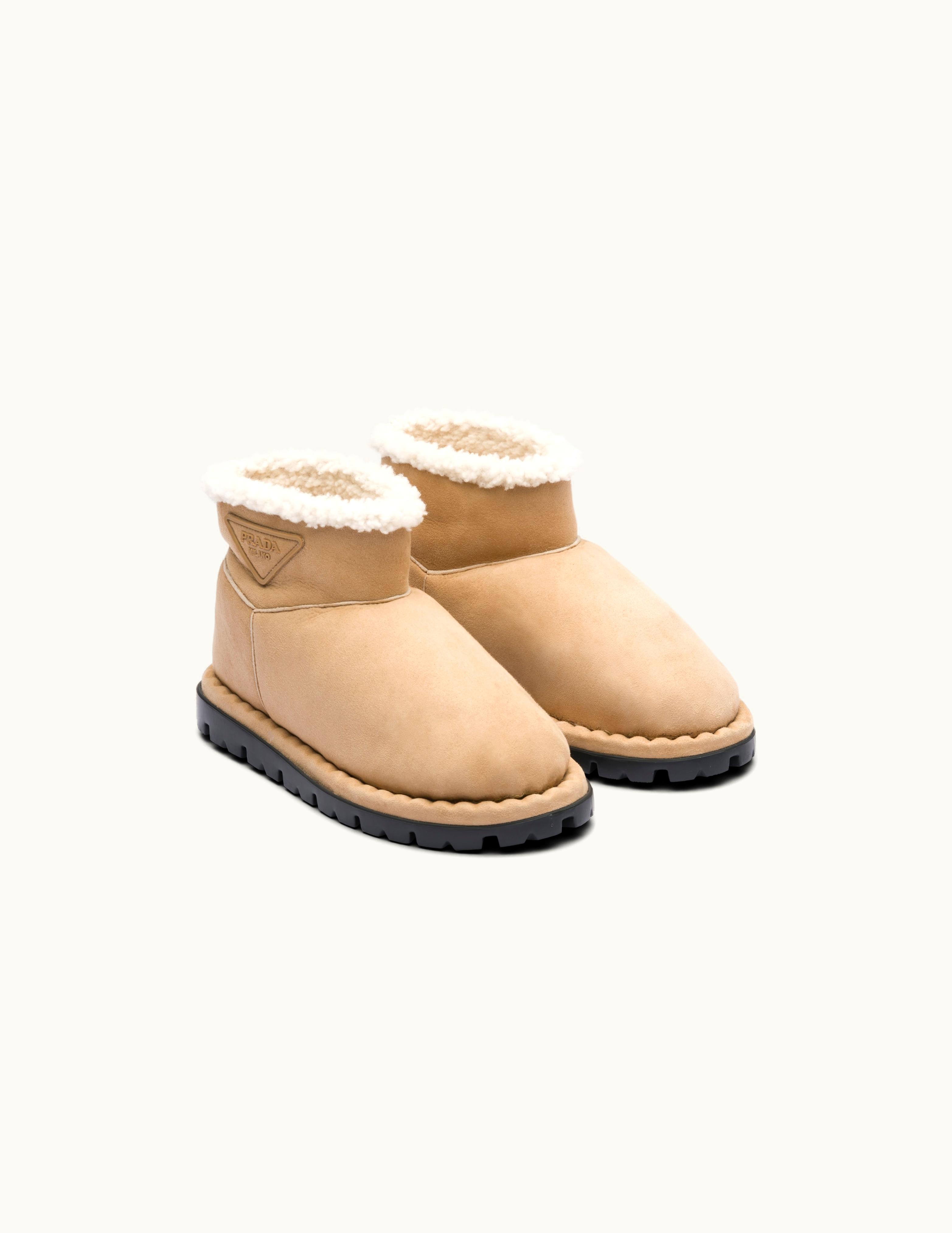 Prada Prada Shearling Logo Booties Ecru