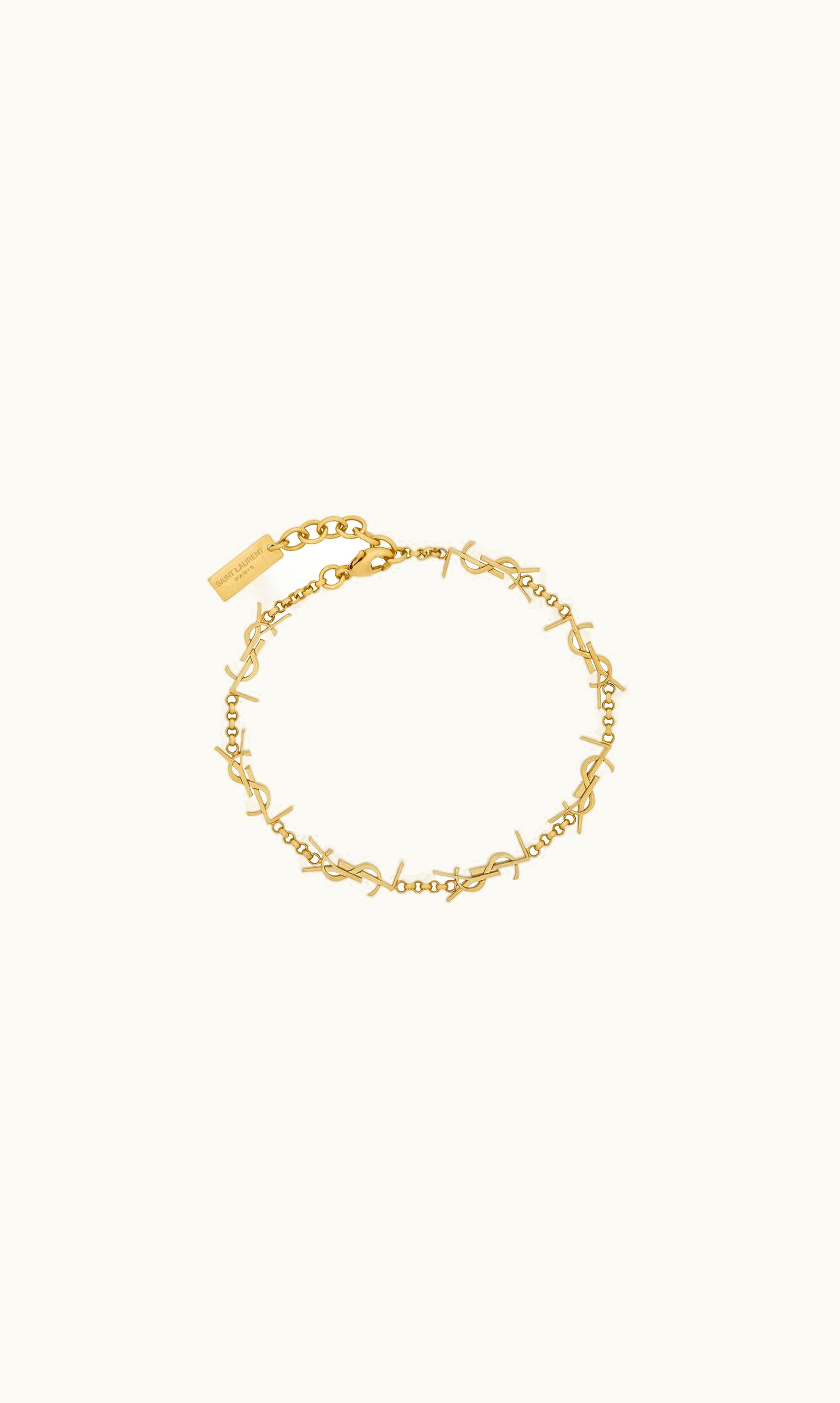 Saint Laurent Saint Laurent Cassandre Multi-Charm Bracelet In Metal Gold