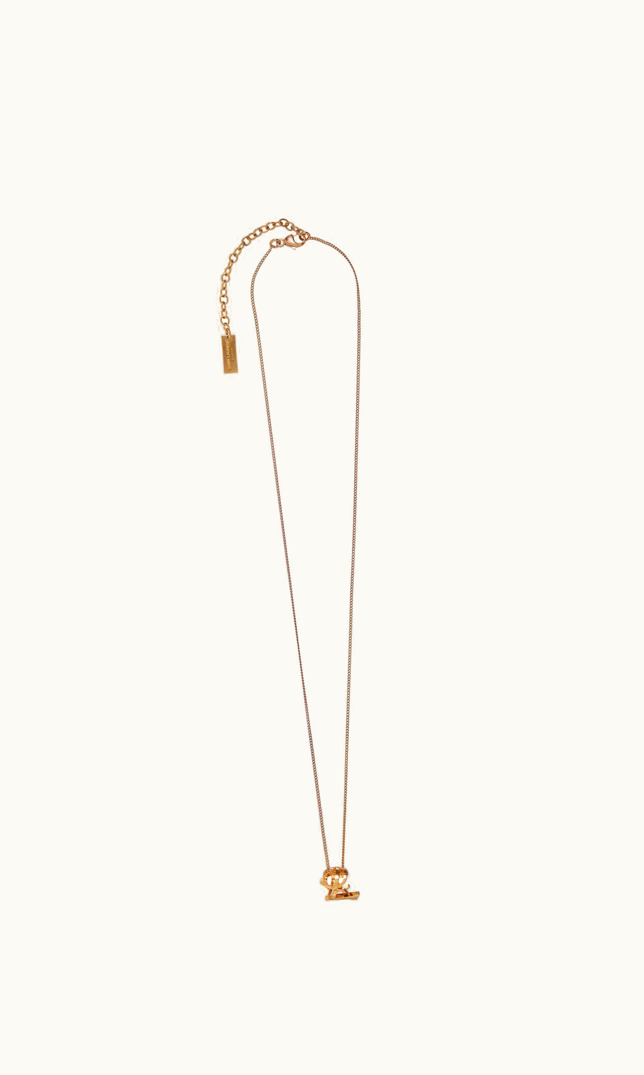 Saint Laurent Saint Laurent Cassandre Twist Pendant Necklace In Metal Gold