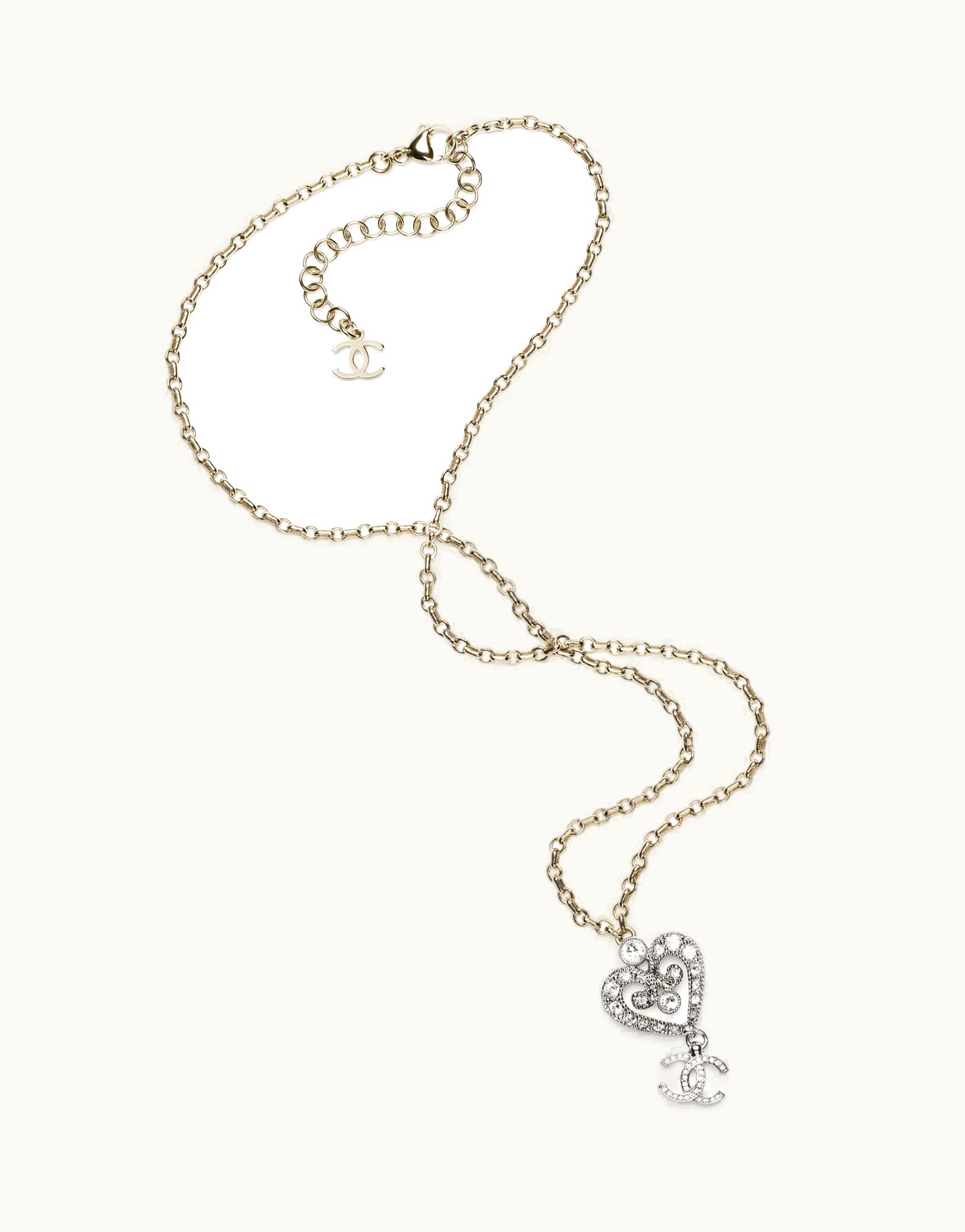 Chanel Chanel Pendant Necklace - Metal & Strass, Silver, Gold & Crystal