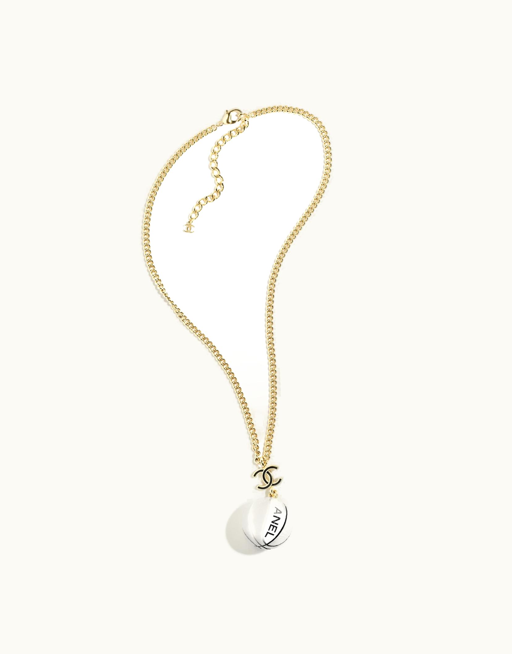 Chanel Chanel Pendant Necklace - Metal & Resin, Gold, Black & White