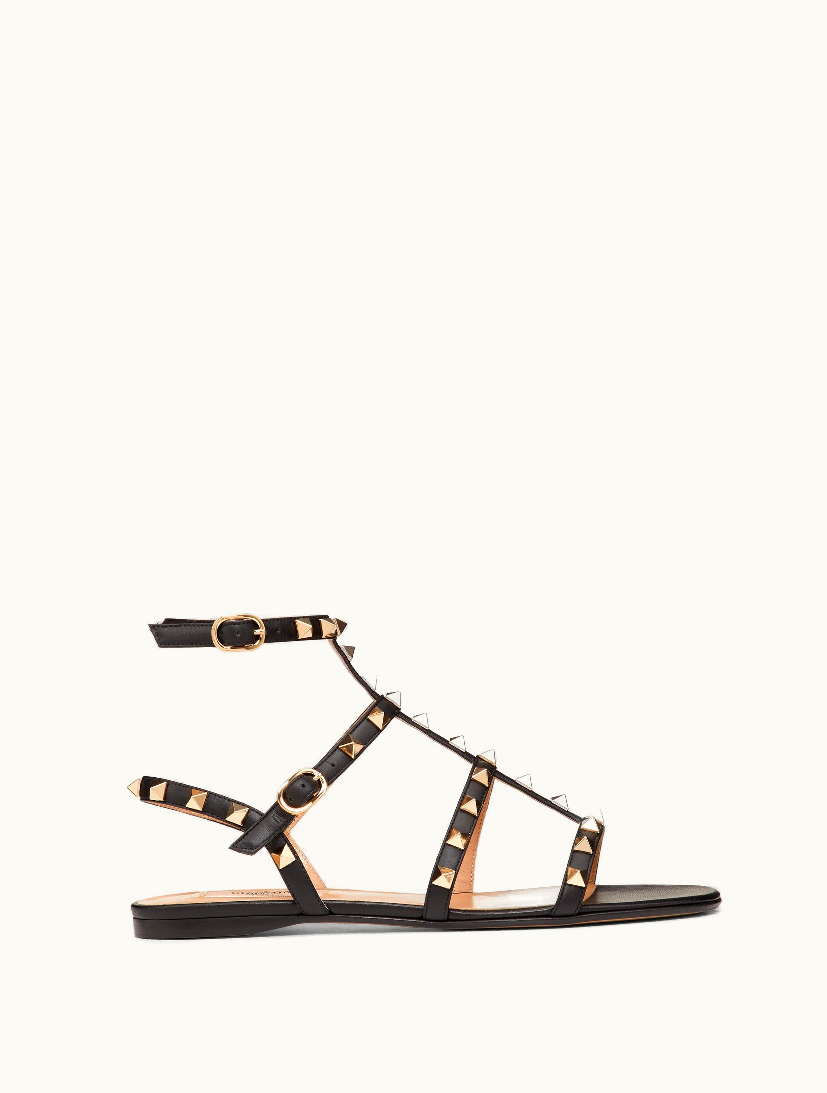 Valentino Valentino Rockstud Flat Calfskin Sandal With Straps For Woman In Almond