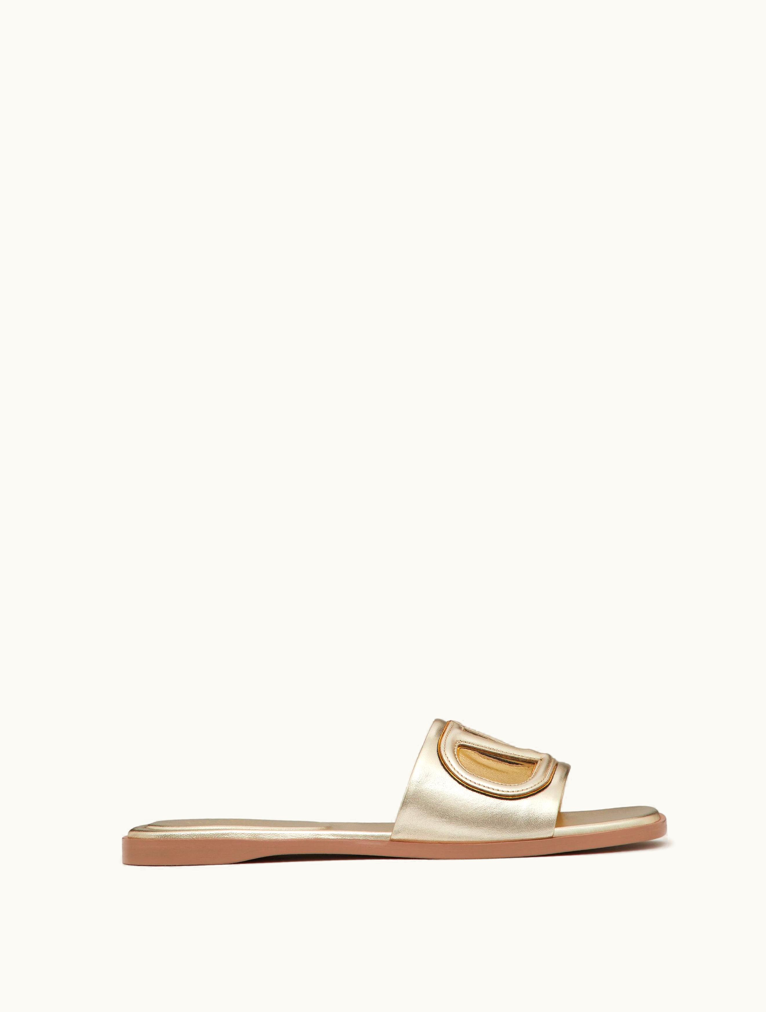 Valentino Valentino Vlogo Cut-out Laminated Nappa Leather Slide Sandal For Woman In Platinum / Antique Brass