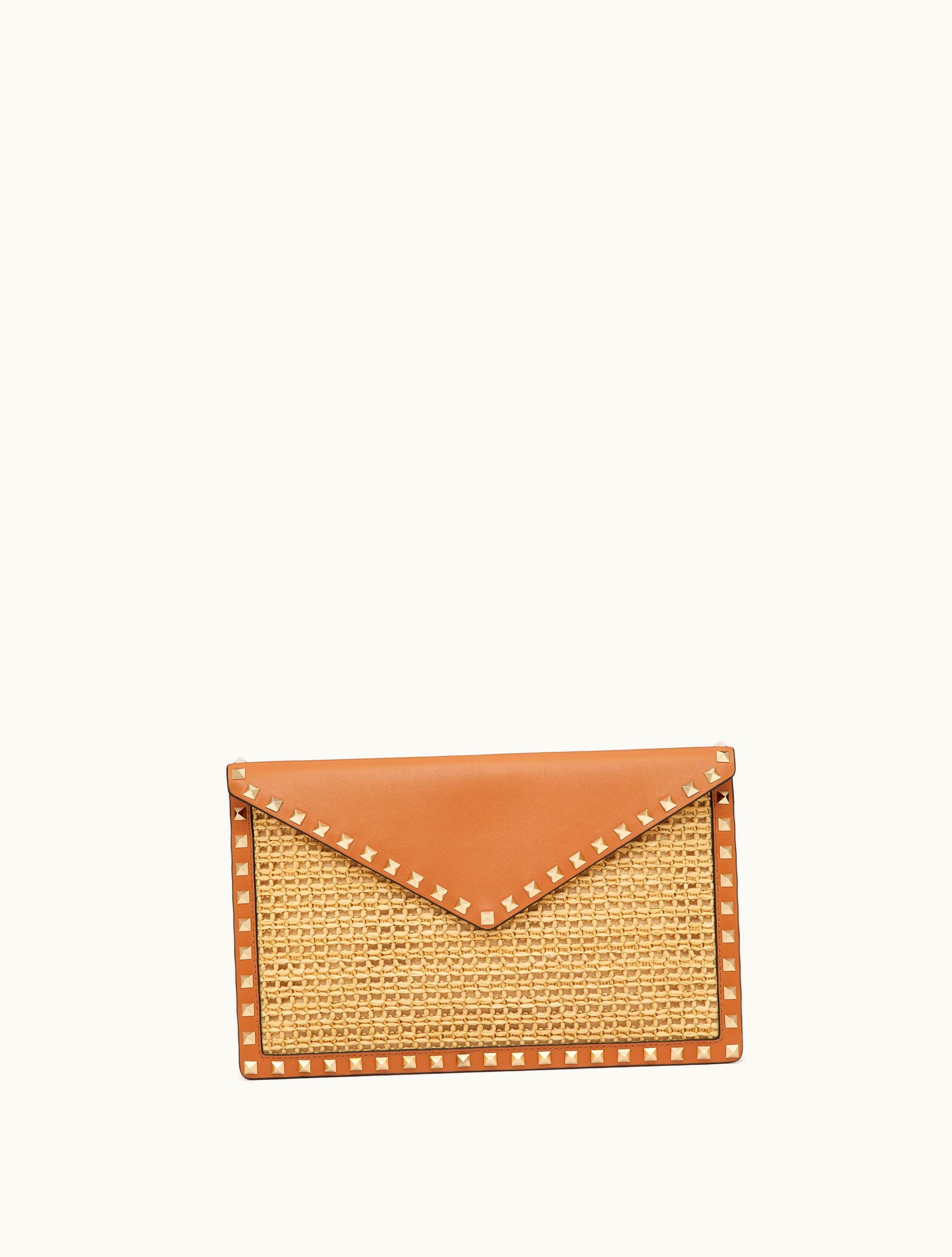 Valentino Valentino Rockstud Raffia Clutch Bag For Woman In Natural / Almond