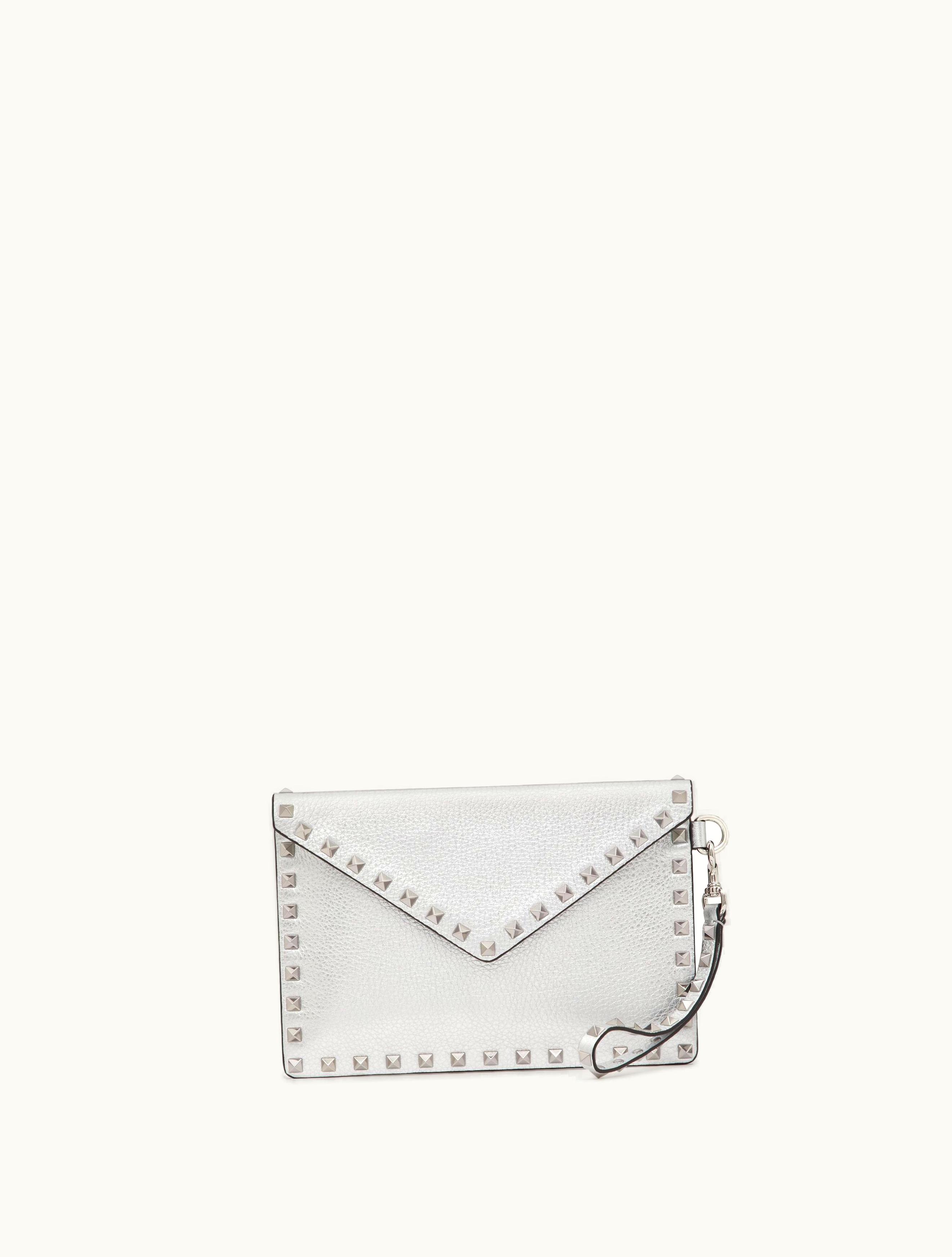 Valentino Valentino Rockstud Metallic Grainy Calfskin Clutch Bag For Woman In Silver
