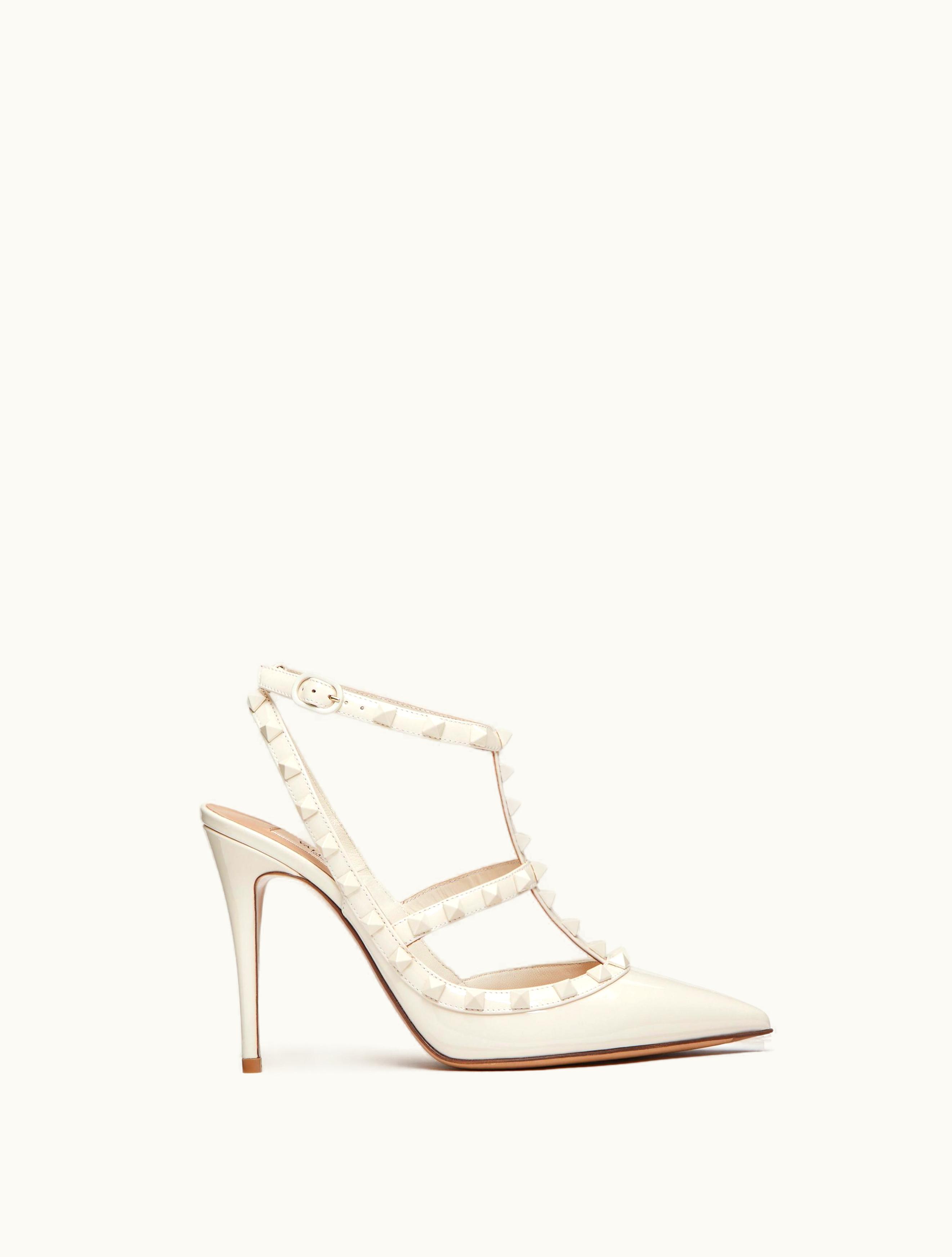 Valentino Valentino Rockstud Ankle Strap Patent-leather Pump With Tonal Studs 100 MM For Woman In Light Ivory