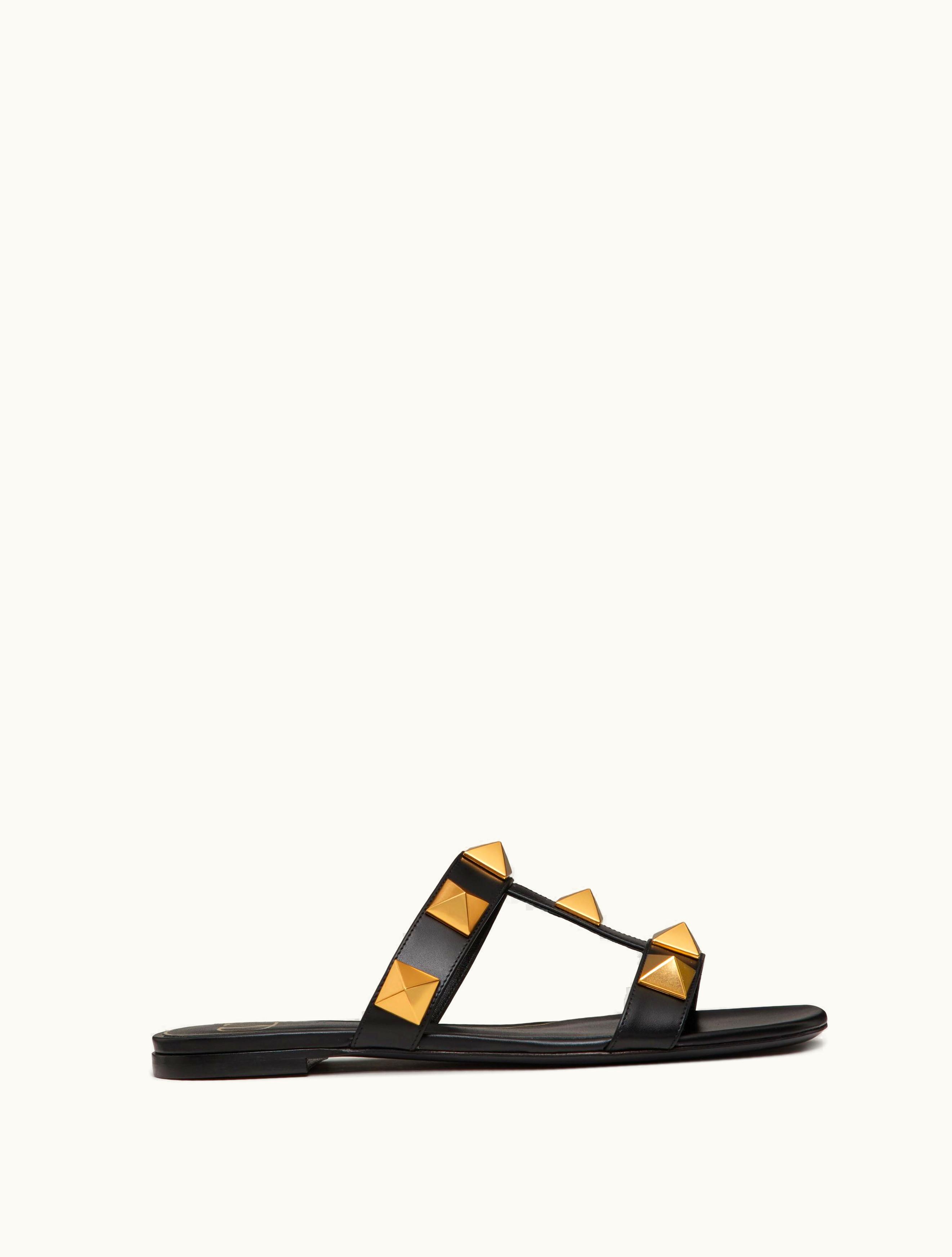 Valentino Valentino Flat Roman Stud Calfskin Slide Sandal For Woman In Light Ivory