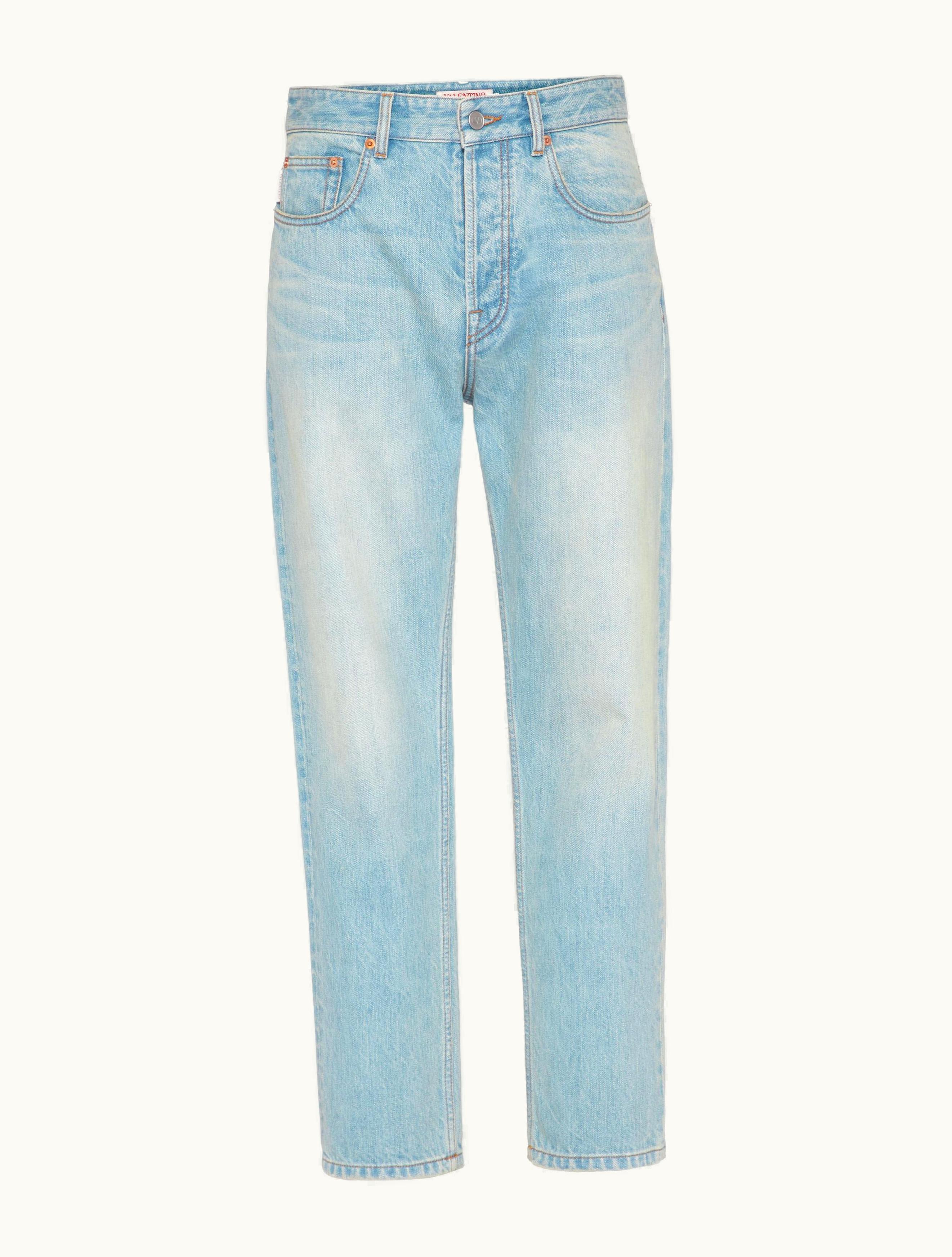 Valentino Valentino Denim Trousers With Embossed Vlogo Signature For Man In Denim