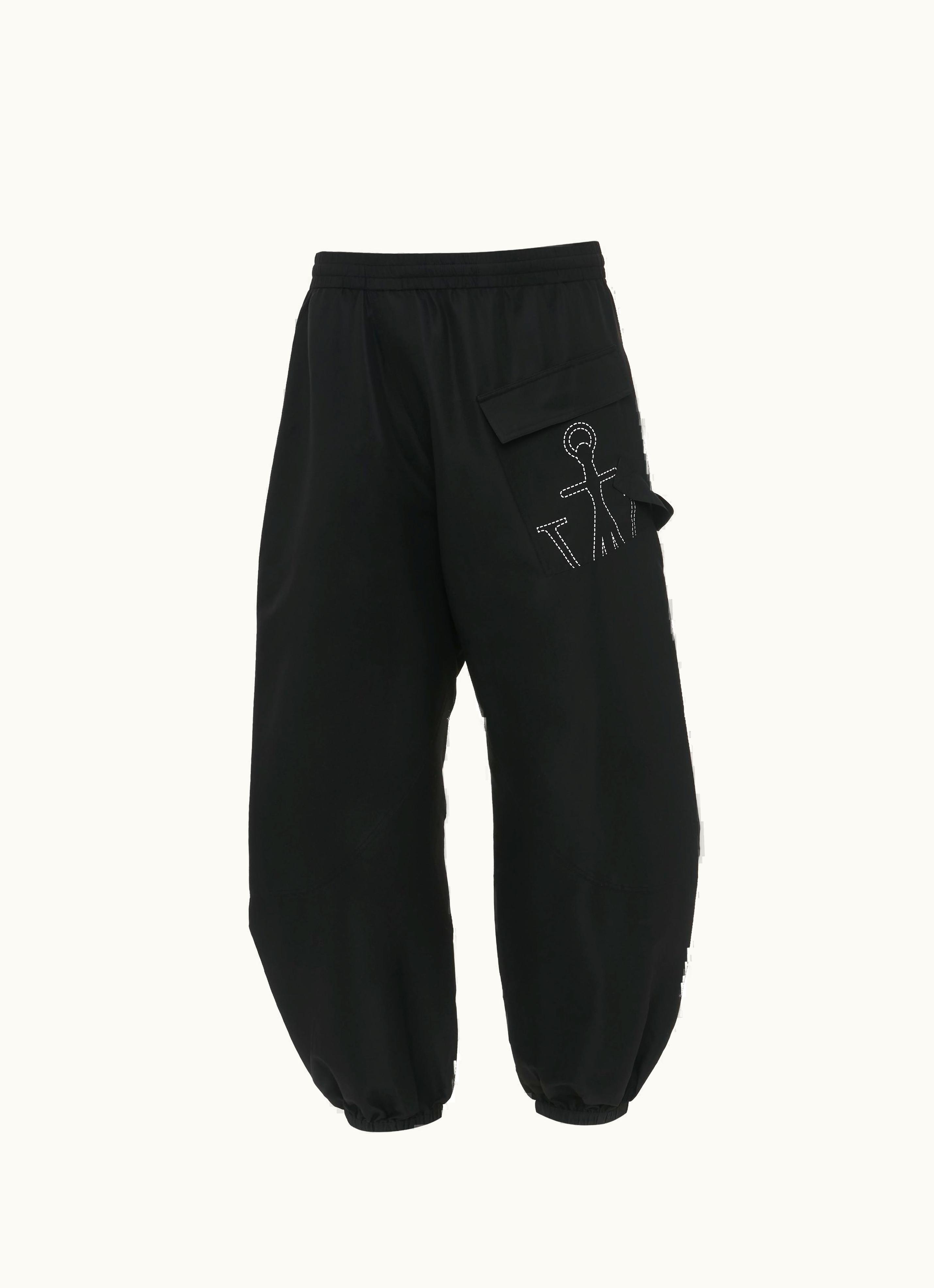 JW Anderson JW Anderson Twisted Anchor Joggers in Black