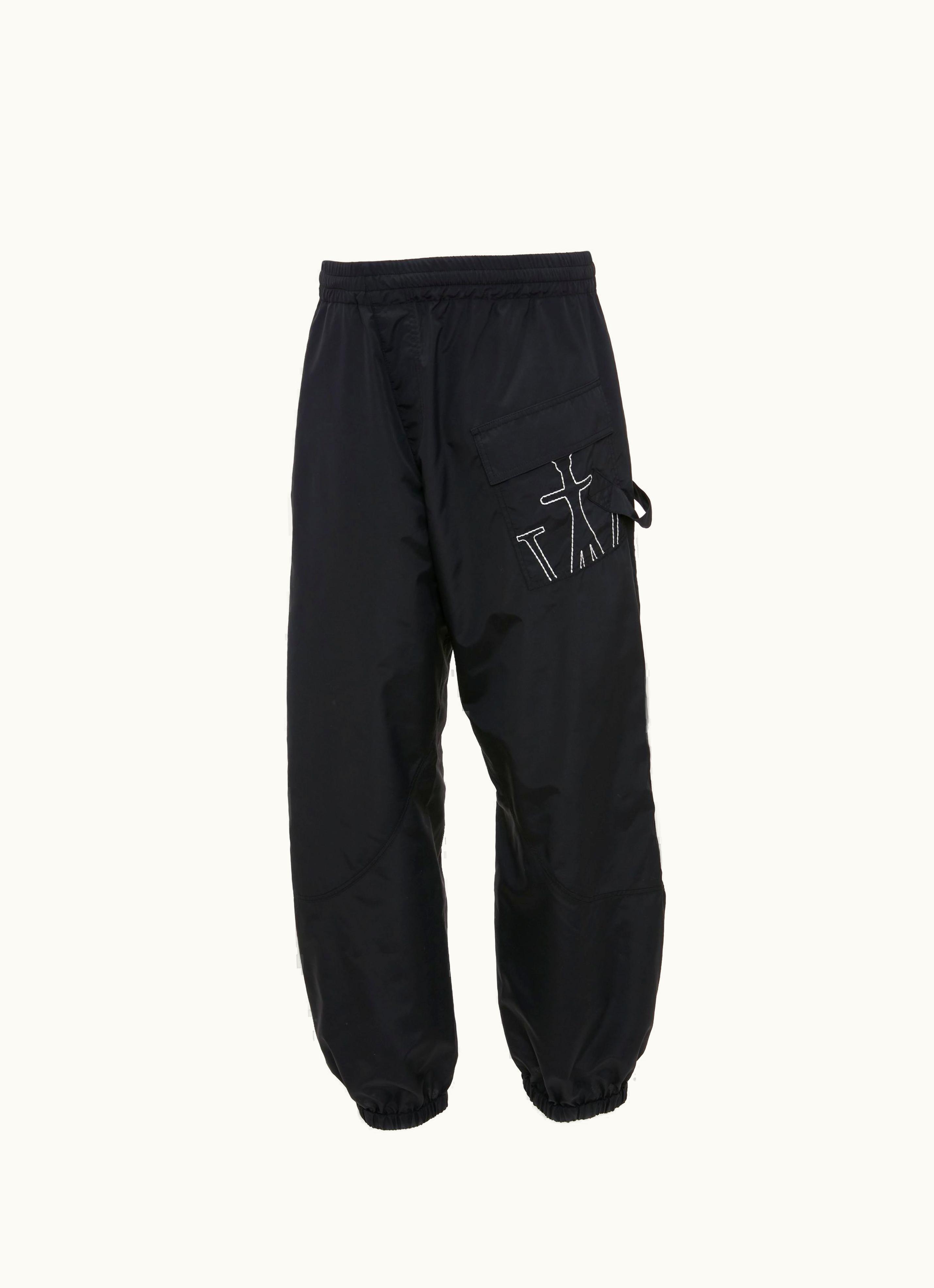 JW Anderson JW Anderson Twisted Joggers With Anchor Logo Embroidery In Black