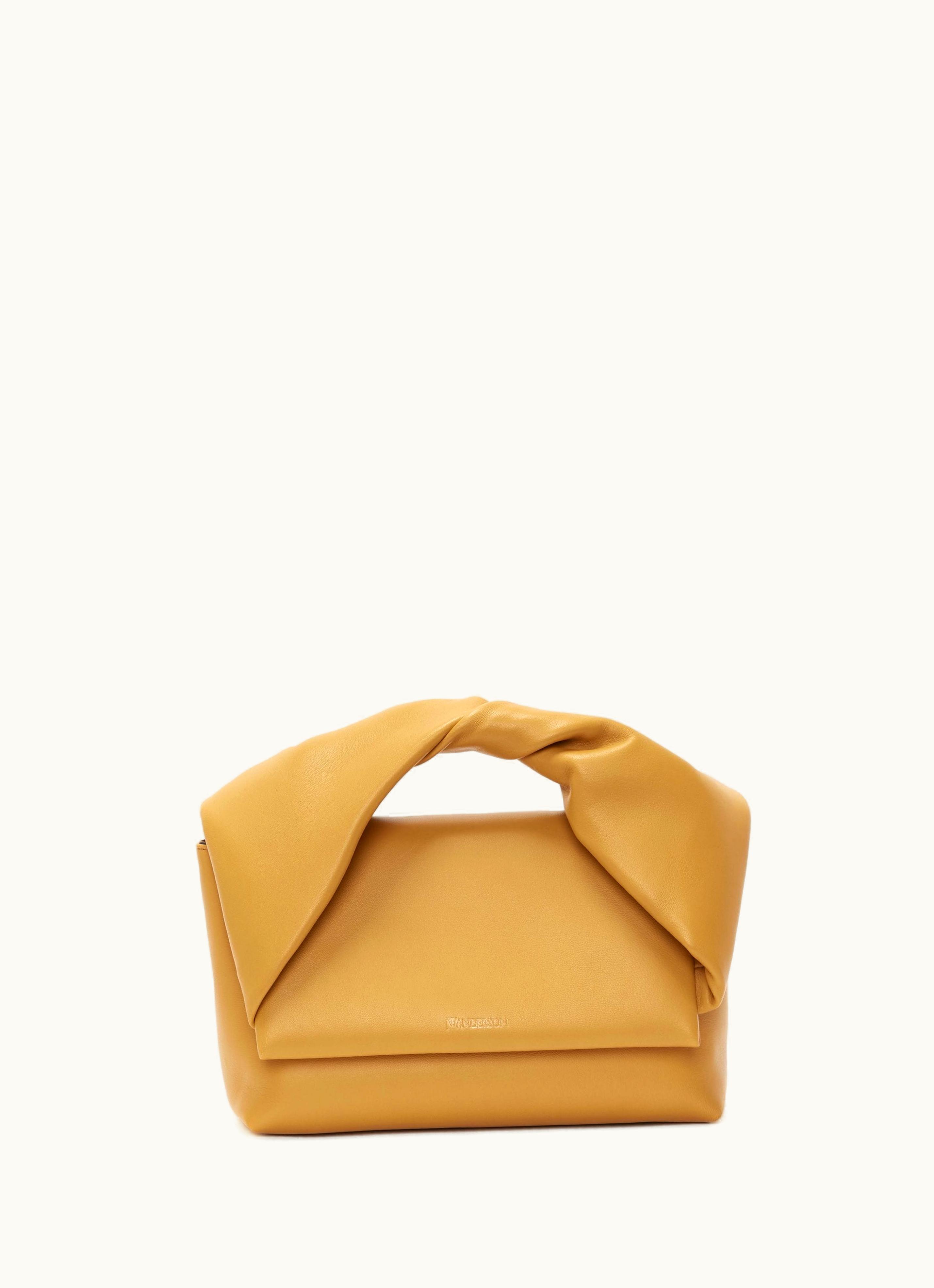 JW Anderson JW Anderson Large Twister Leather Top Handle Bag In Mustard